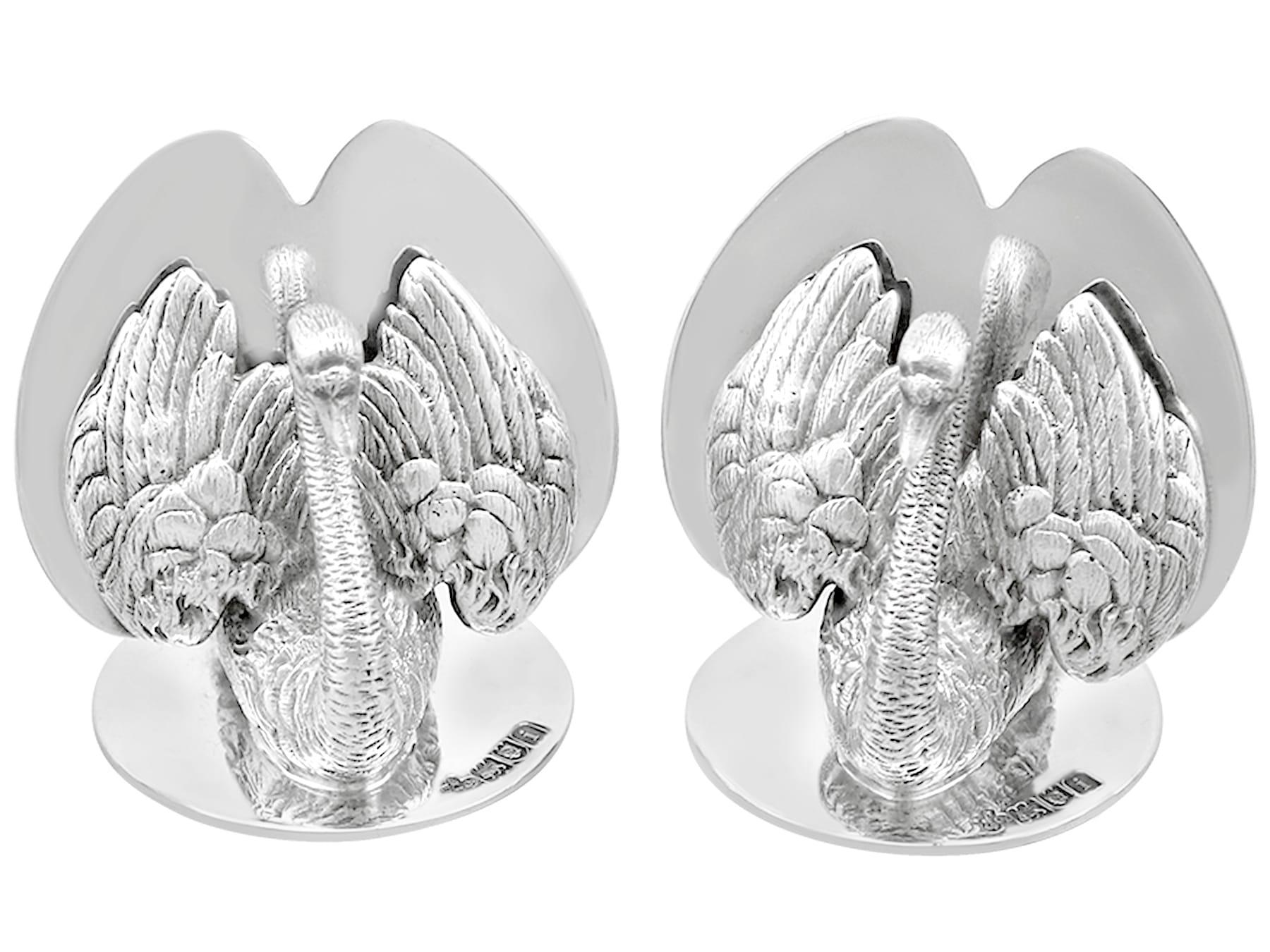 An exceptional, fine and impressive set of four antique Edwardian English sterling silver swan menu / card holders; an addition to our diverse dining silverware collection

These exceptional, fine and impressive antique Edwardian sterling silver