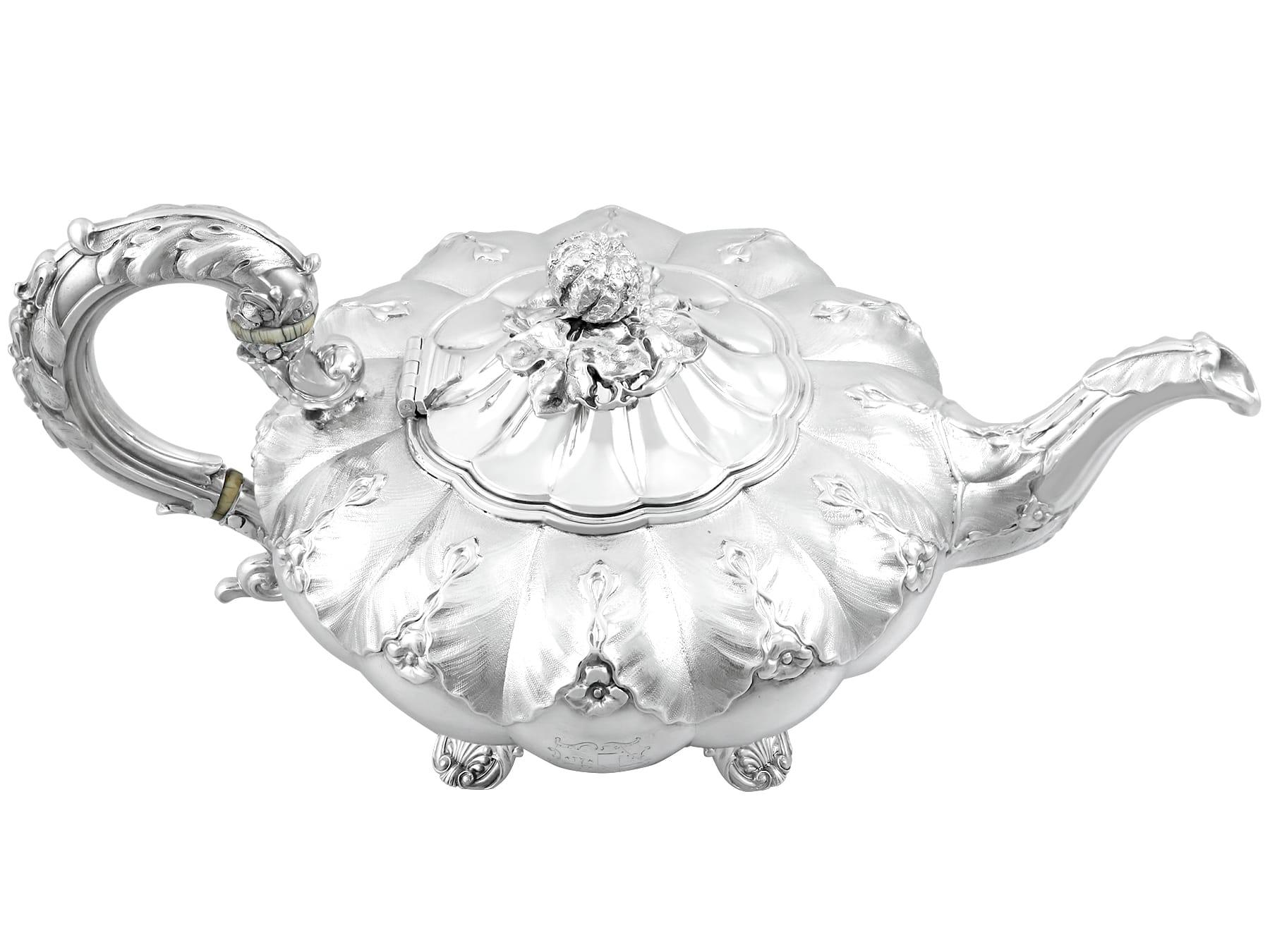 An exceptional, fine and impressive 19th Century antique George IV English sterling silver teapot; an addition to our silver teaware collection

This exceptional, fine and impressive antique George IV sterling silver teapot has a compressed pumpkin
