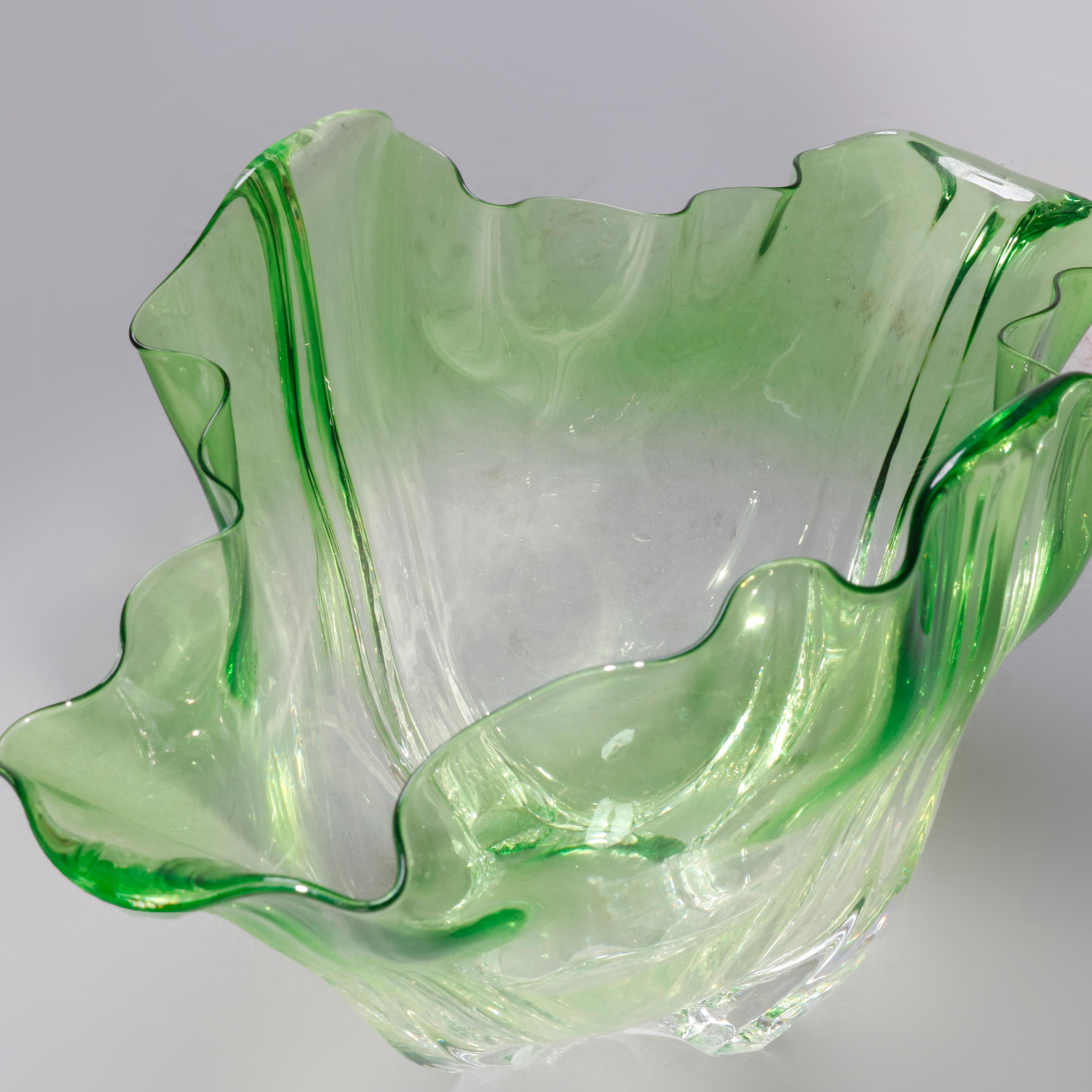 An antique center bowl by Steuben offers emerald green to colorless art glass construction in ruffled handkerchief form, unsigned, circa 1930

Measures- 6