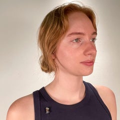 Antique Stick Pin with Carved Opal Bust of a Man attributed to Wilhelm Schmidt