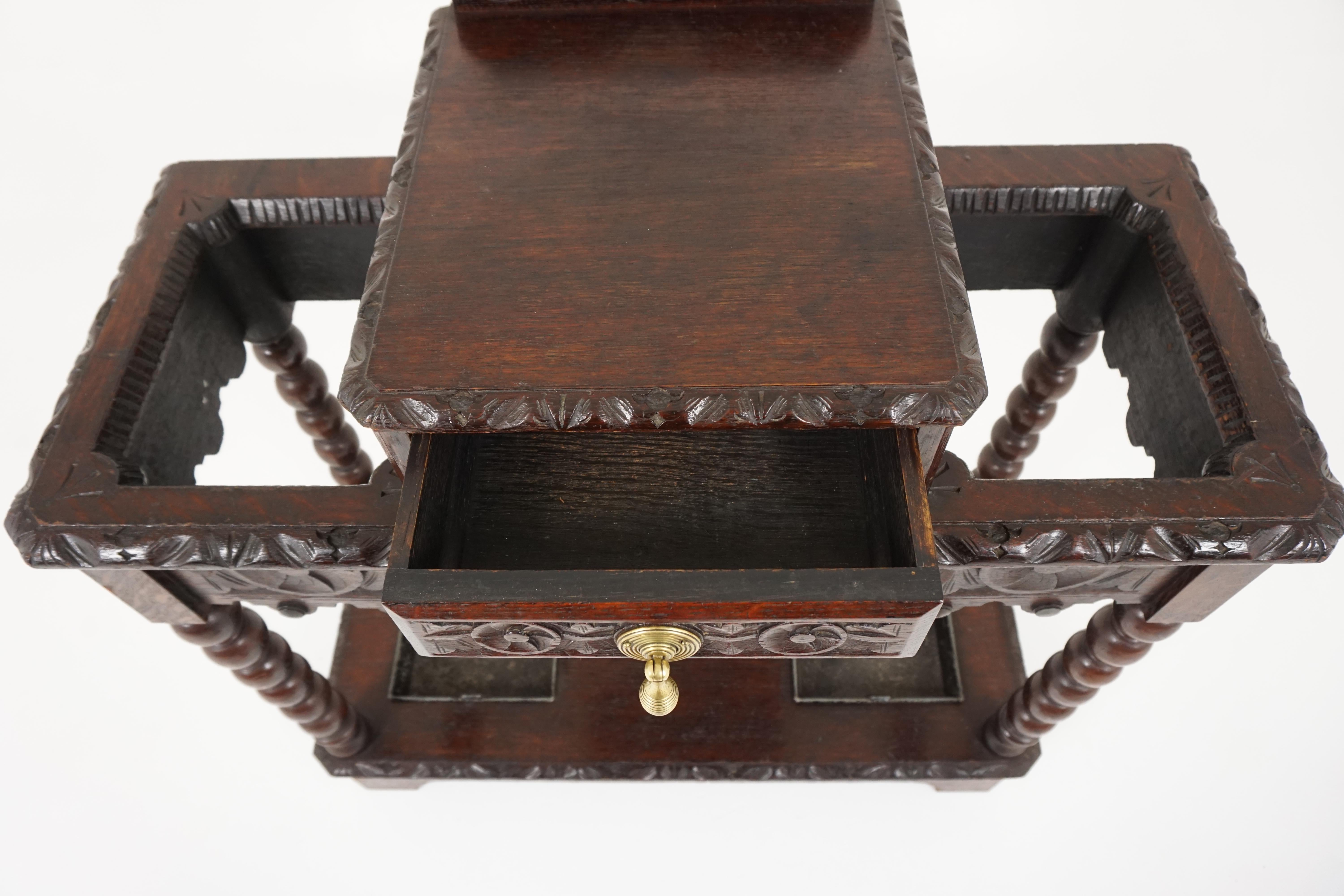 Antique stick stand, carved tiger oak umbrella hall stand, antique furniture, Scotland 1880, B1800

Scotland, 1880
Solid oak
Original finish
Small carved back
Rectangular top with carved edge
Over a carved drawer with the original brass