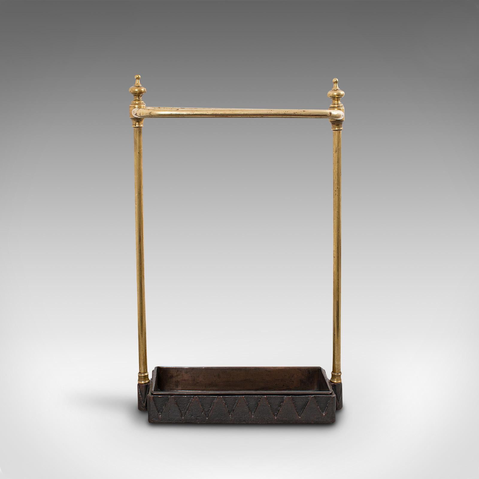 This is a dashing antique stick stand. A French, brass and copper hallway cane or umbrella rack, dating to the early Victorian period, circa 1850.

Classic French elegance with lasting appeal
Displaying a desirable aged patina
Brass frame