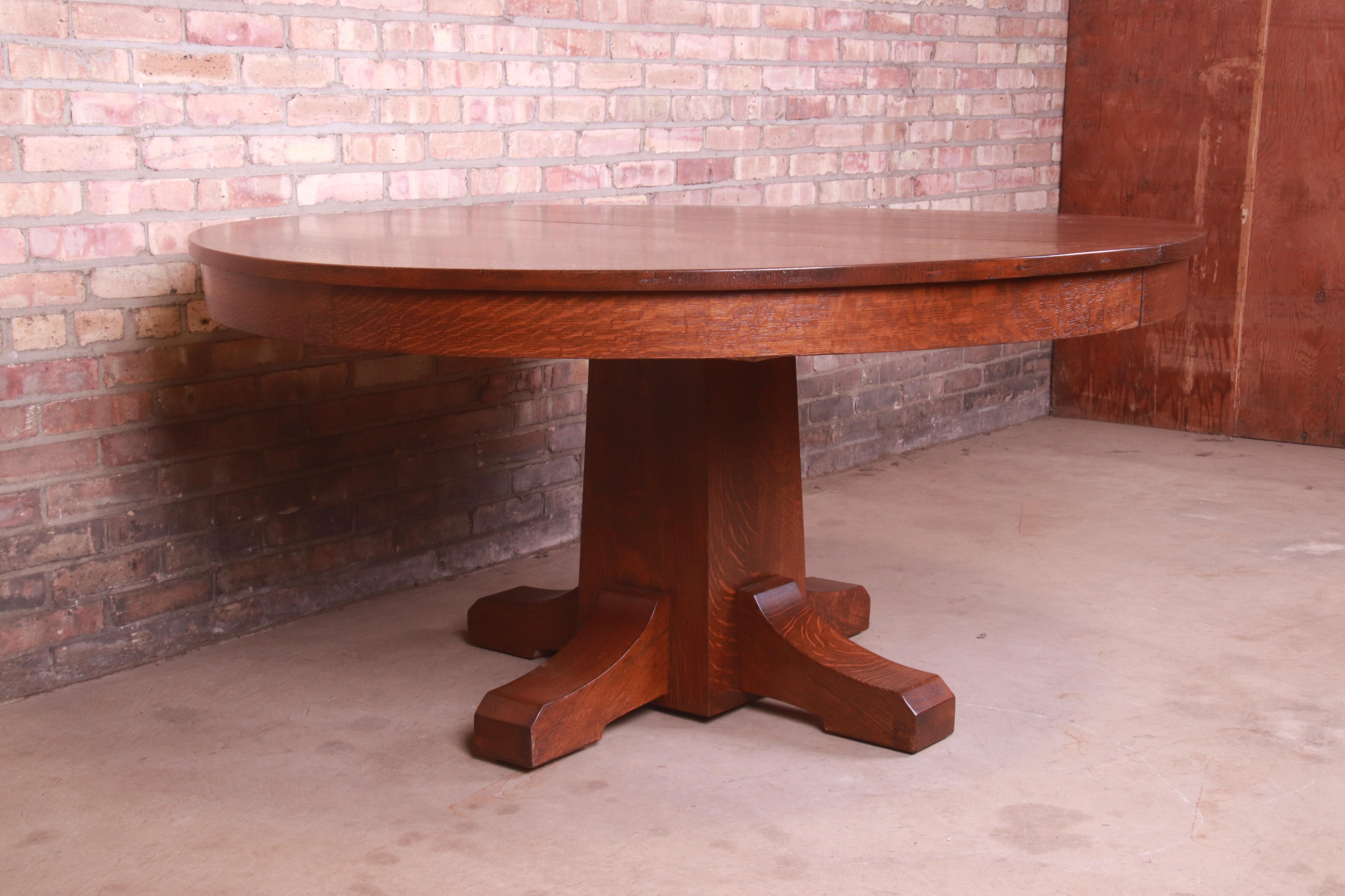 American Antique Stickley Arts & Crafts Oak Pedestal Dining Table with Seven Leaves For Sale