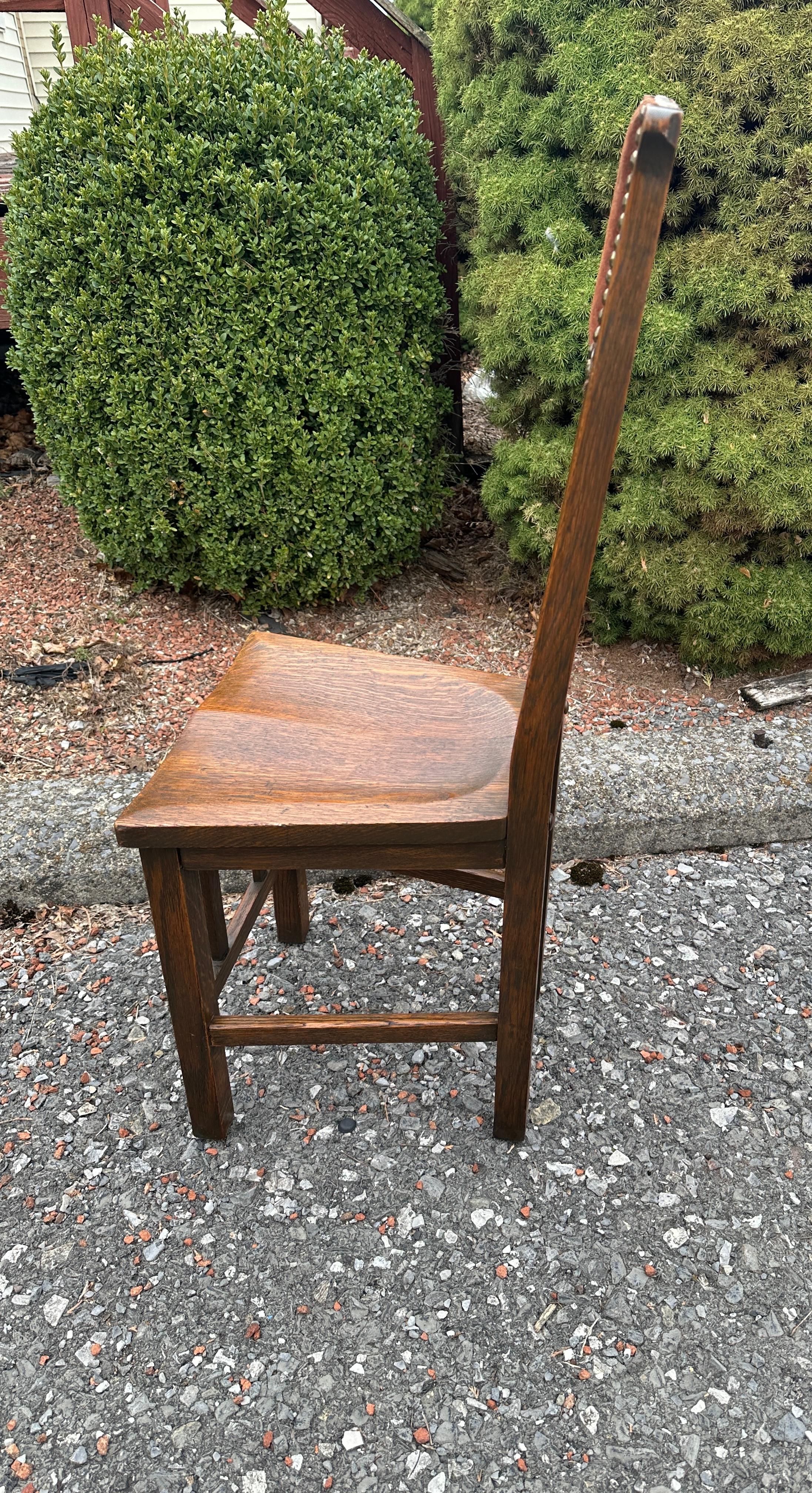 Antique Stickley Brothers Narrow Chair - W7975

This is an antique Stickley Brothers narrow chair made in the early 1900s. It is in very good condition, great form and design, and a great selection of quarter-sawn oak.  It is upholstered with