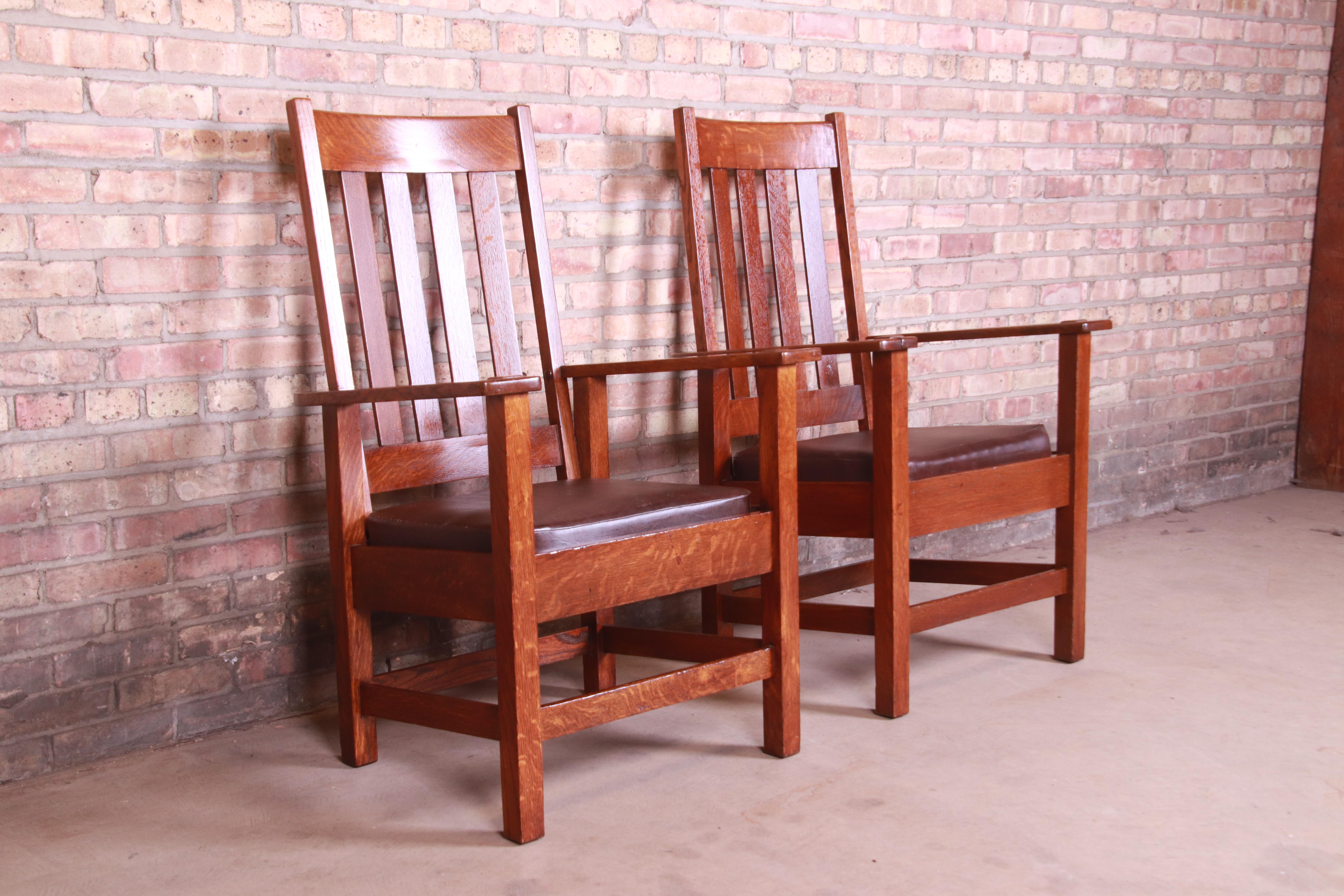 Early 20th Century Antique Stickley Brothers Oak and Brown Leather High Back Lounge Chairs, Pair