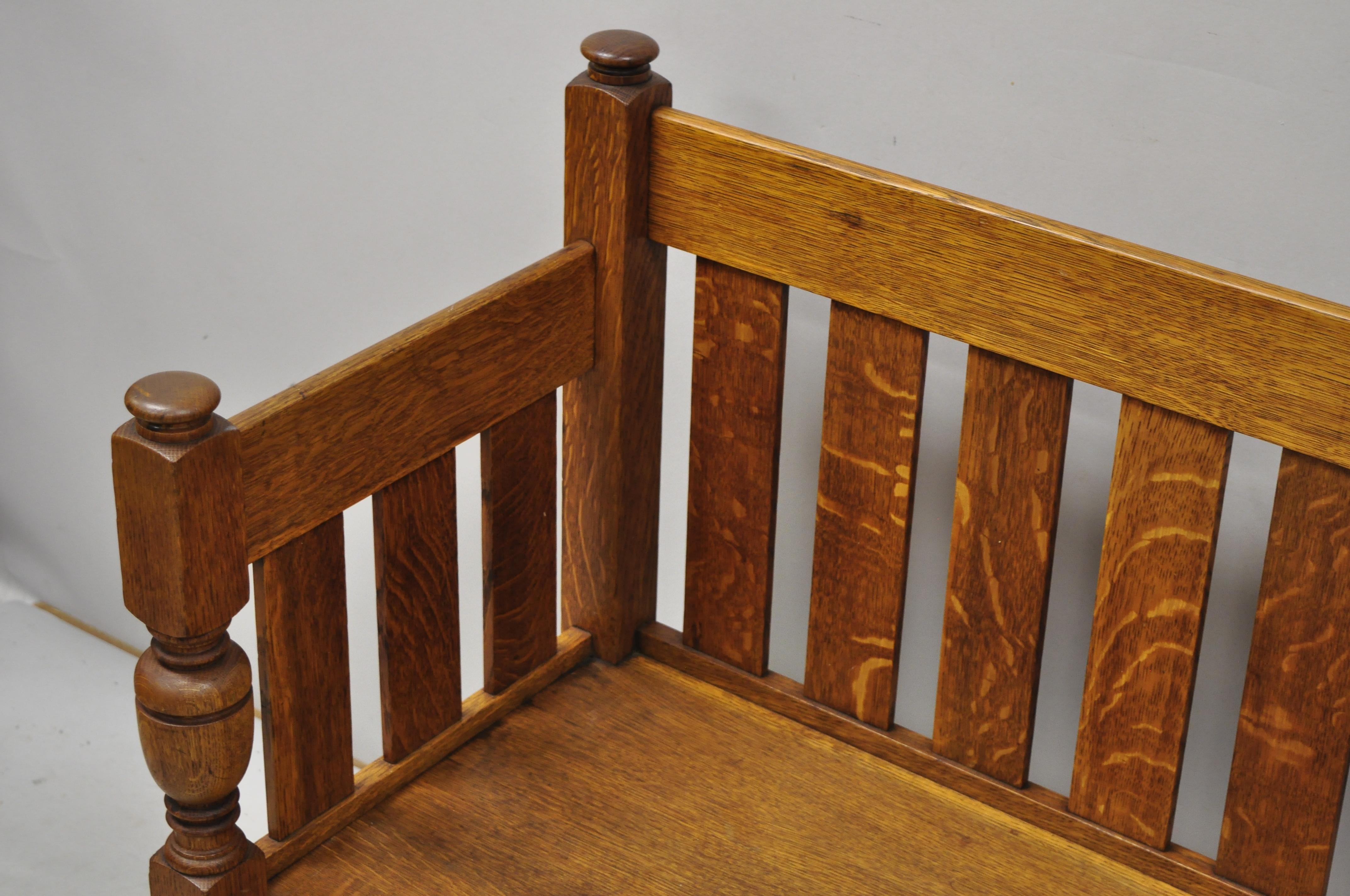 Antique Stickley Brothers Quaint Furniture oak slat back hall bench Arts & Crafts. Item features a slatted back and sides, solid wood construction, beautiful wood grain, original label, very nice antique item, quality American craftsmanship, circa