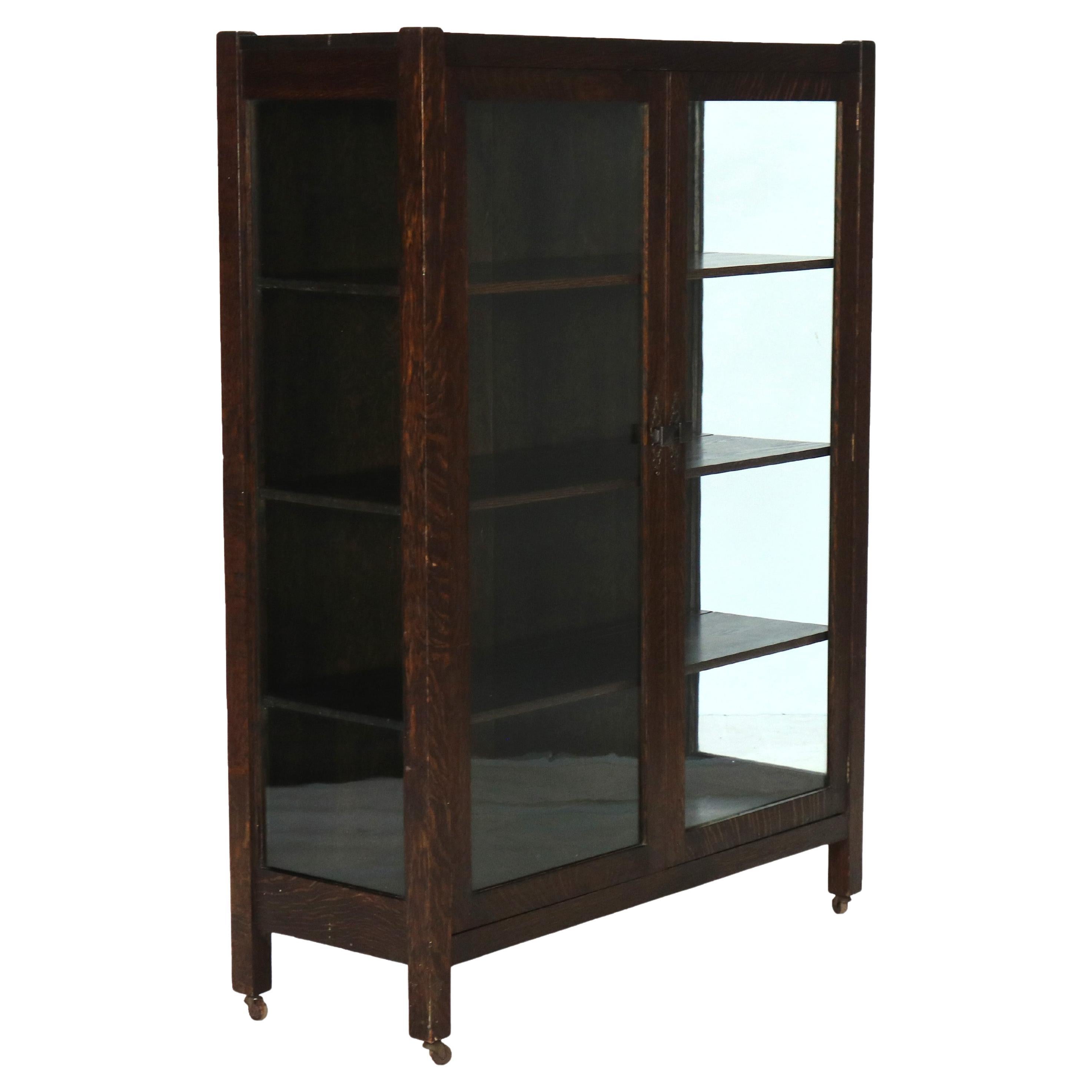 Antigua librería de 2 puertas Stickley School Arts & Crafts Mission Oak C1920.   

Medidas - 56,5