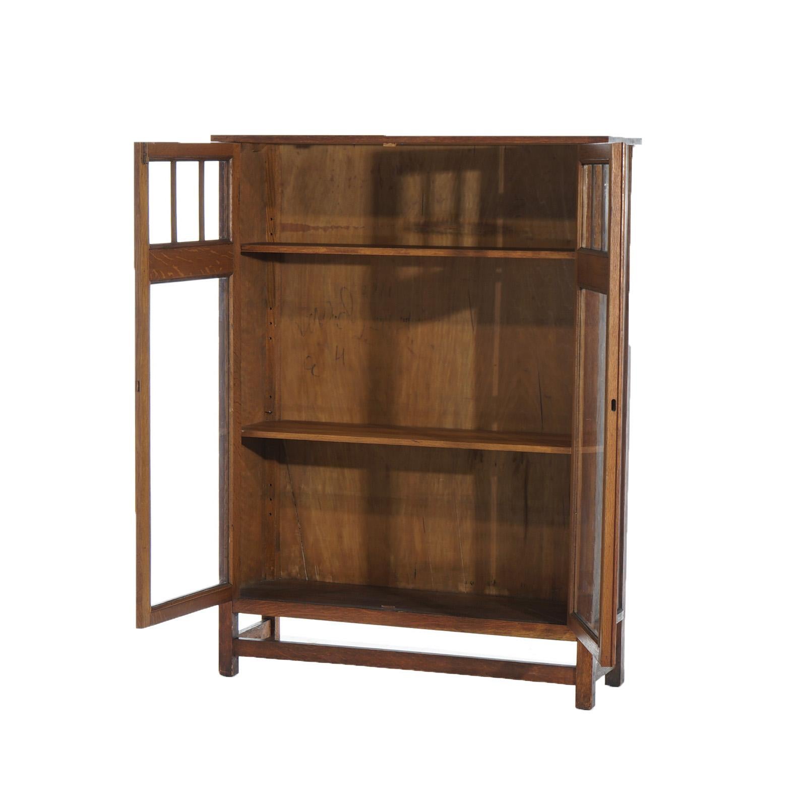 ***Ask About Reduced In-House Delivery Rates - Reliable Professional Service & Fully Insured***
Antique Arts & Crafts Stickley School Mission Oak Bookcase with Double Glass Doors, Adjustable Shelved Interior and Raised on Straight Square Legs