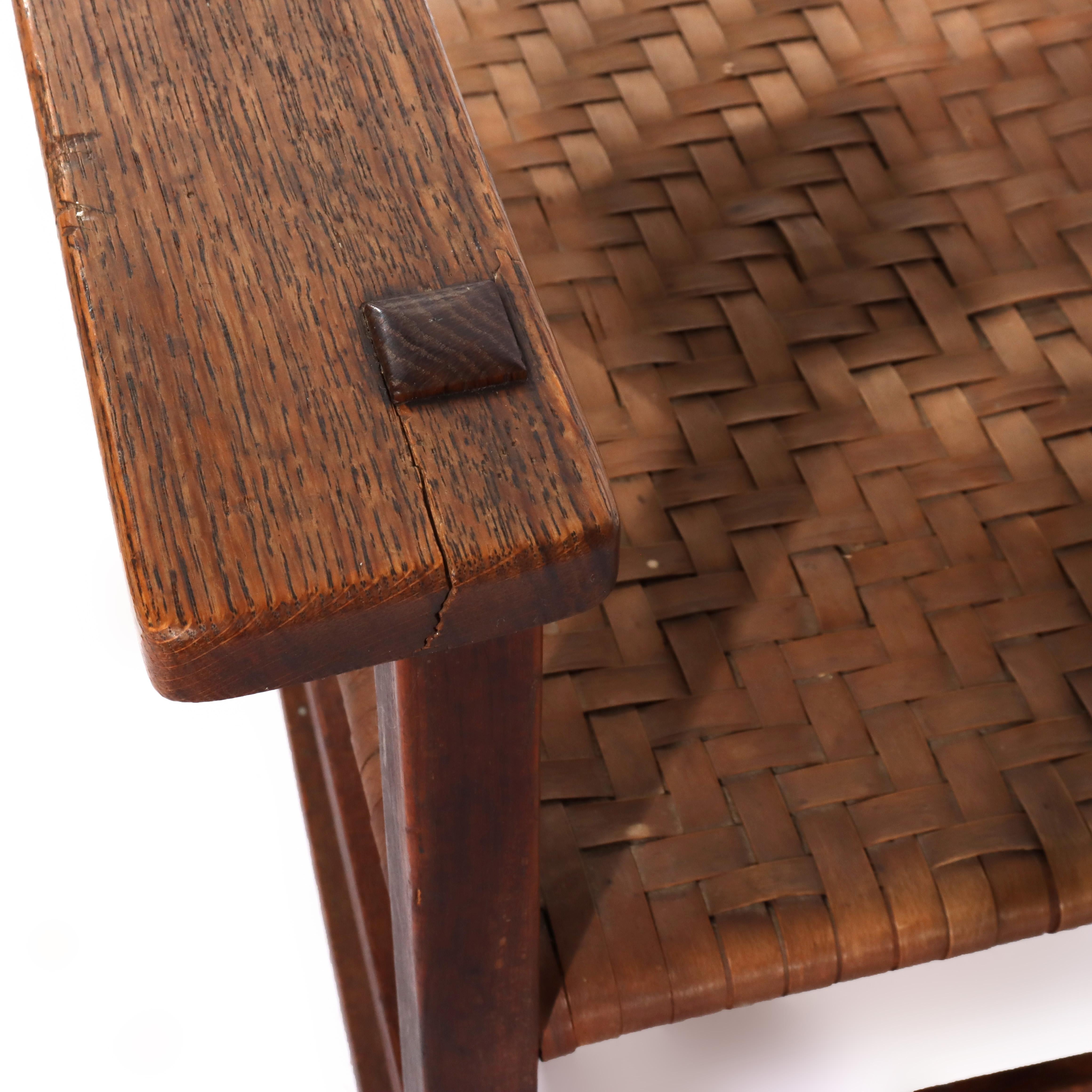 Ancienne bascule Stickley School en Oak Oak avec siège en jonc C1920 en vente 4