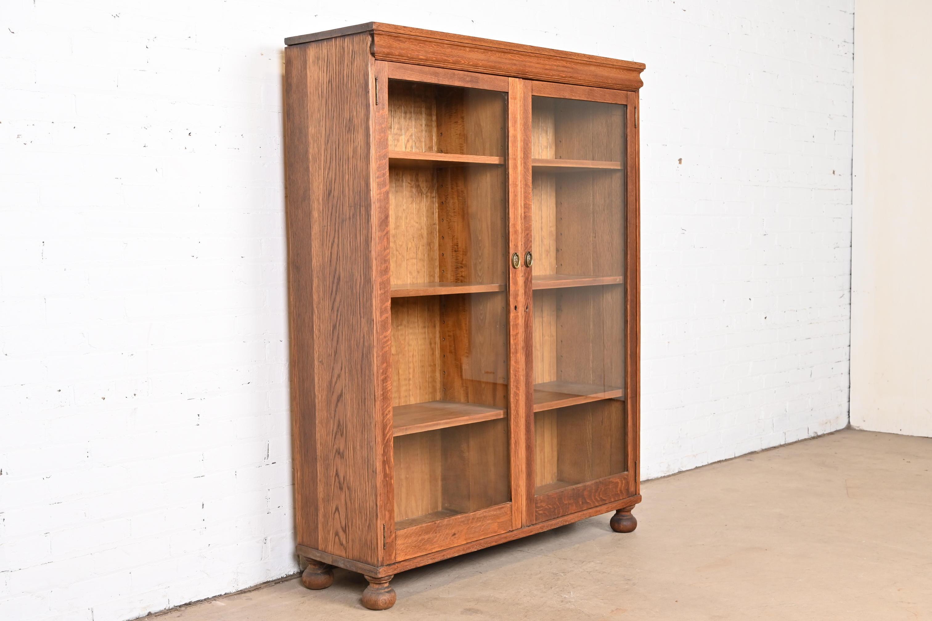 American Antique Stickley Style Arts & Crafts Oak Glass Front Double Bookcase, Circa 1900 For Sale