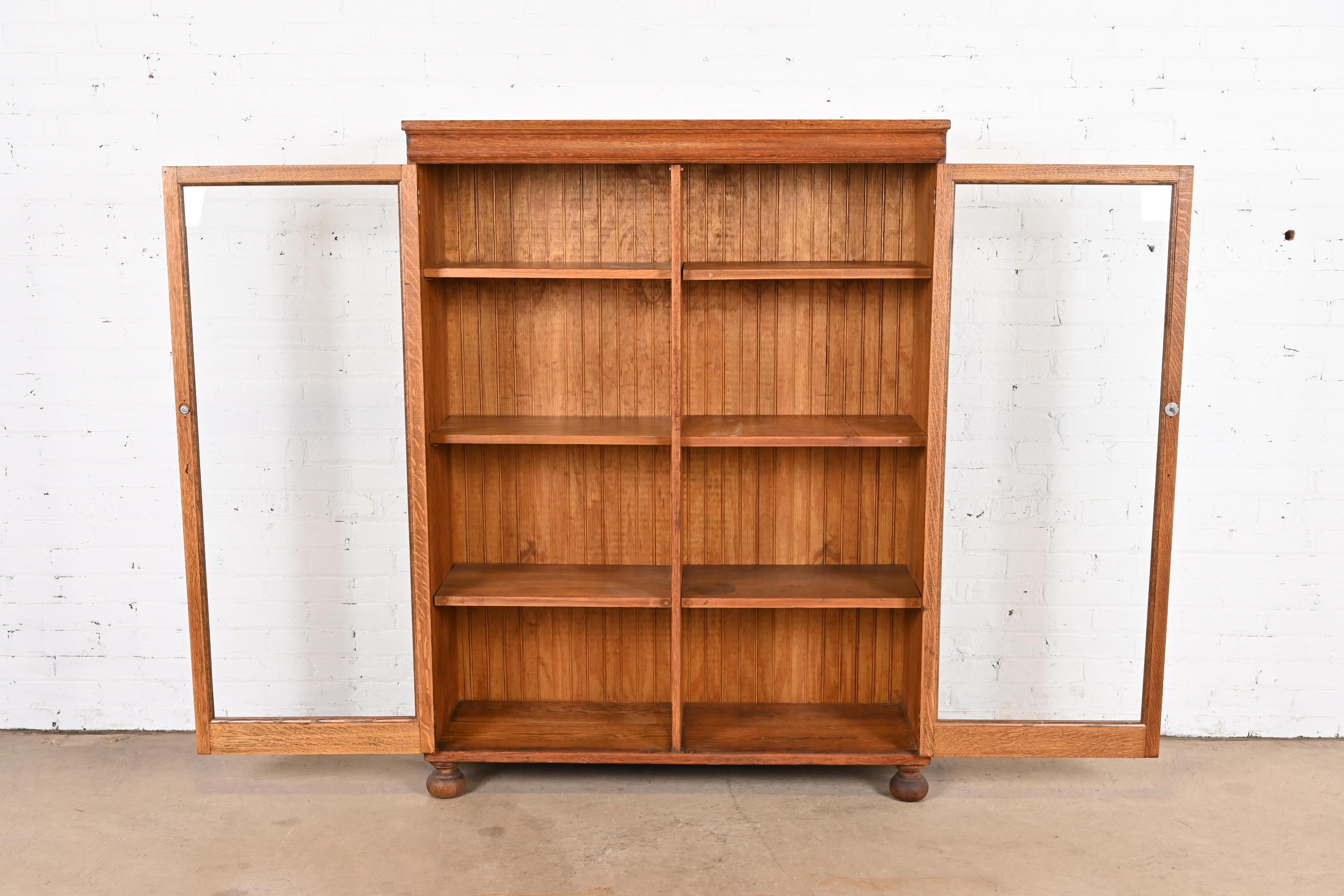 20th Century Antique Stickley Style Arts & Crafts Oak Glass Front Double Bookcase, Circa 1900