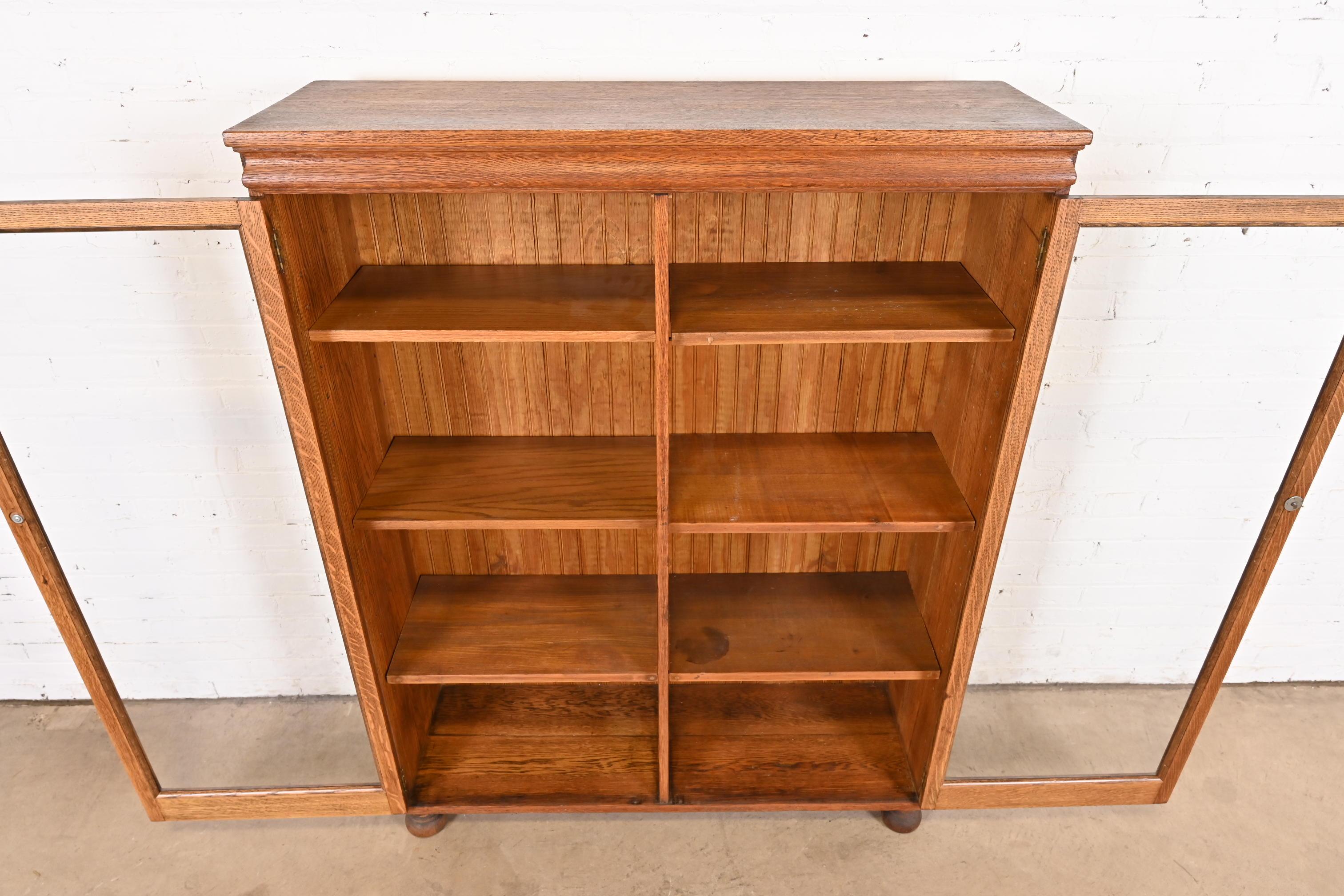 Brass Antique Stickley Style Arts & Crafts Oak Glass Front Double Bookcase, Circa 1900 For Sale