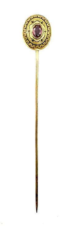 Antico fermaglio in metallo dorato con smalto in pasta