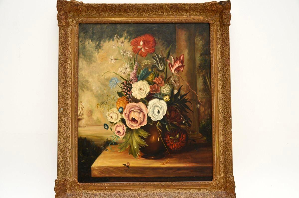 A charming and beautifully executed antique still life oil painting on canvass by Jay Ward, dating from around the 1900-1920 period.

It depicts a beautiful scene of flowers stood on a table in a garden. It is a nice size and is beautifully mounted