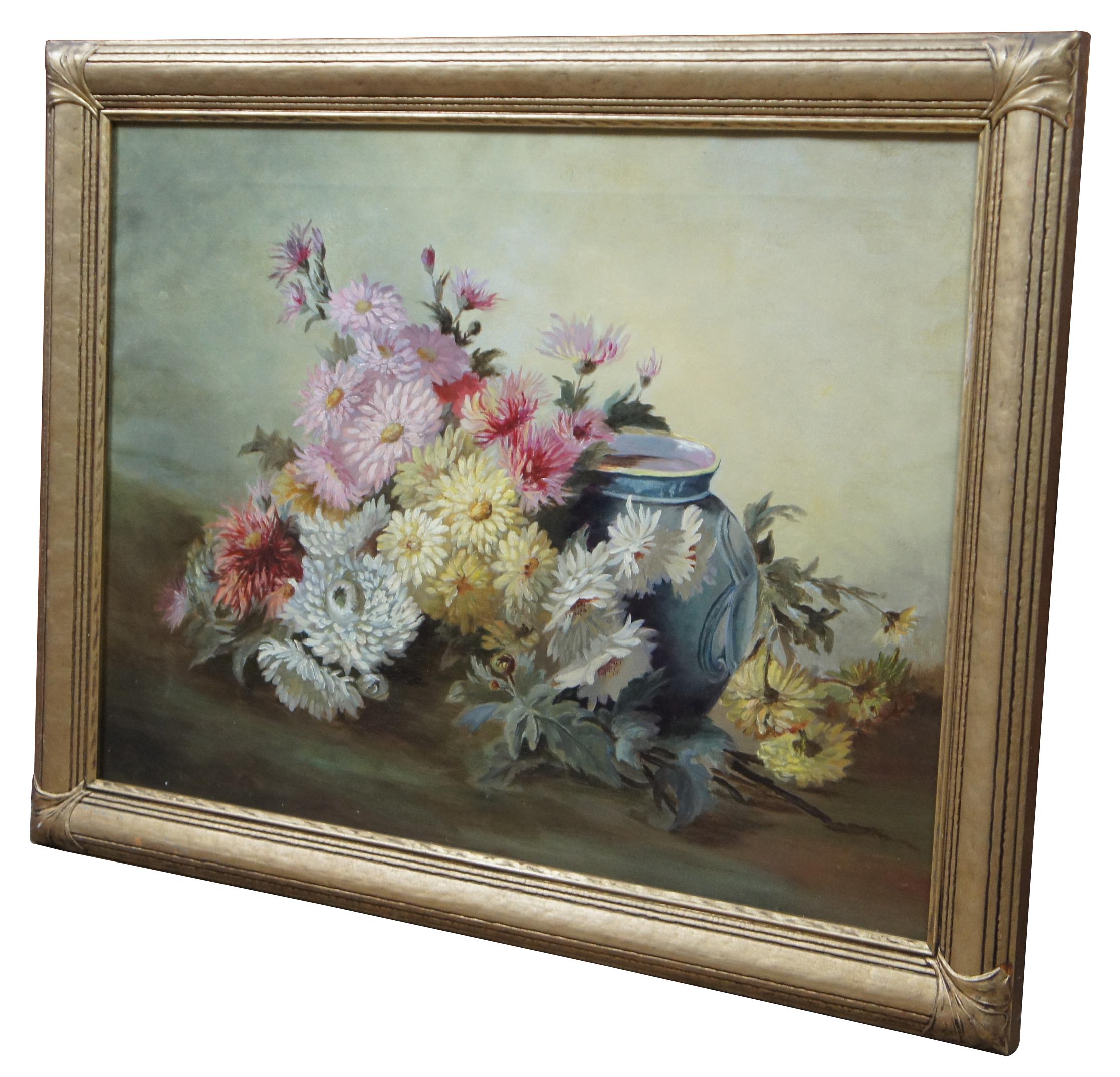 Late 19th-early 20th century still life painting. Features a colorful array of peonies next to a blue porcelain vase. Includes an Art Deco era wooden frame finished in gold.
      
Sans Frame - 23” x 17”