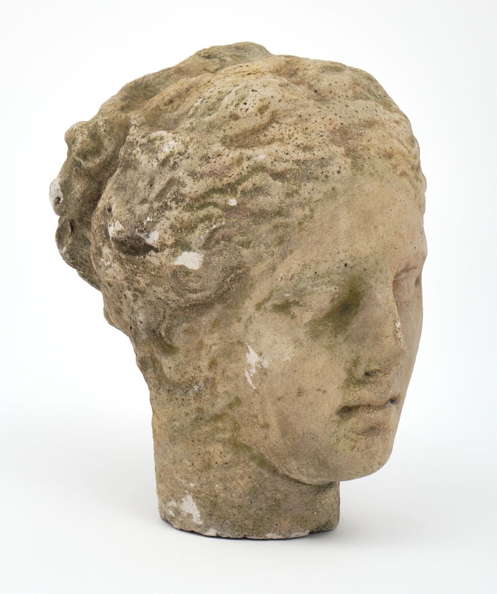 Antique stone bust of Athena. This piece made of reconstituted stone takes the form of Greek goddess Athena. We love the details of this interesting piece.