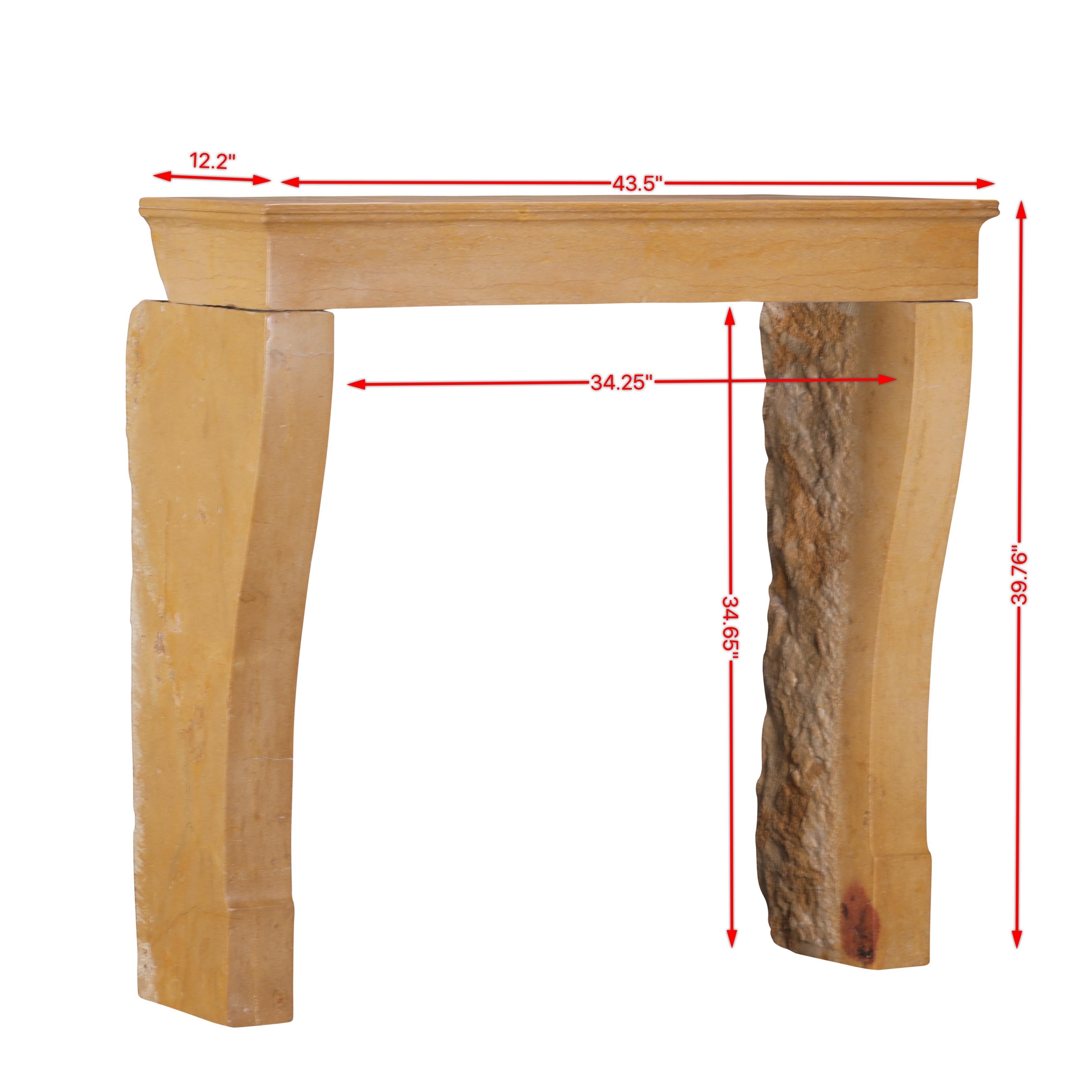 This simple antique fireplace mantel dates from the 19th century and is crafted in the refined Louis Philippe style, originating from the Burgundy region of France. Made from locally quarried Burgundy limestone, this piece displays a soft
