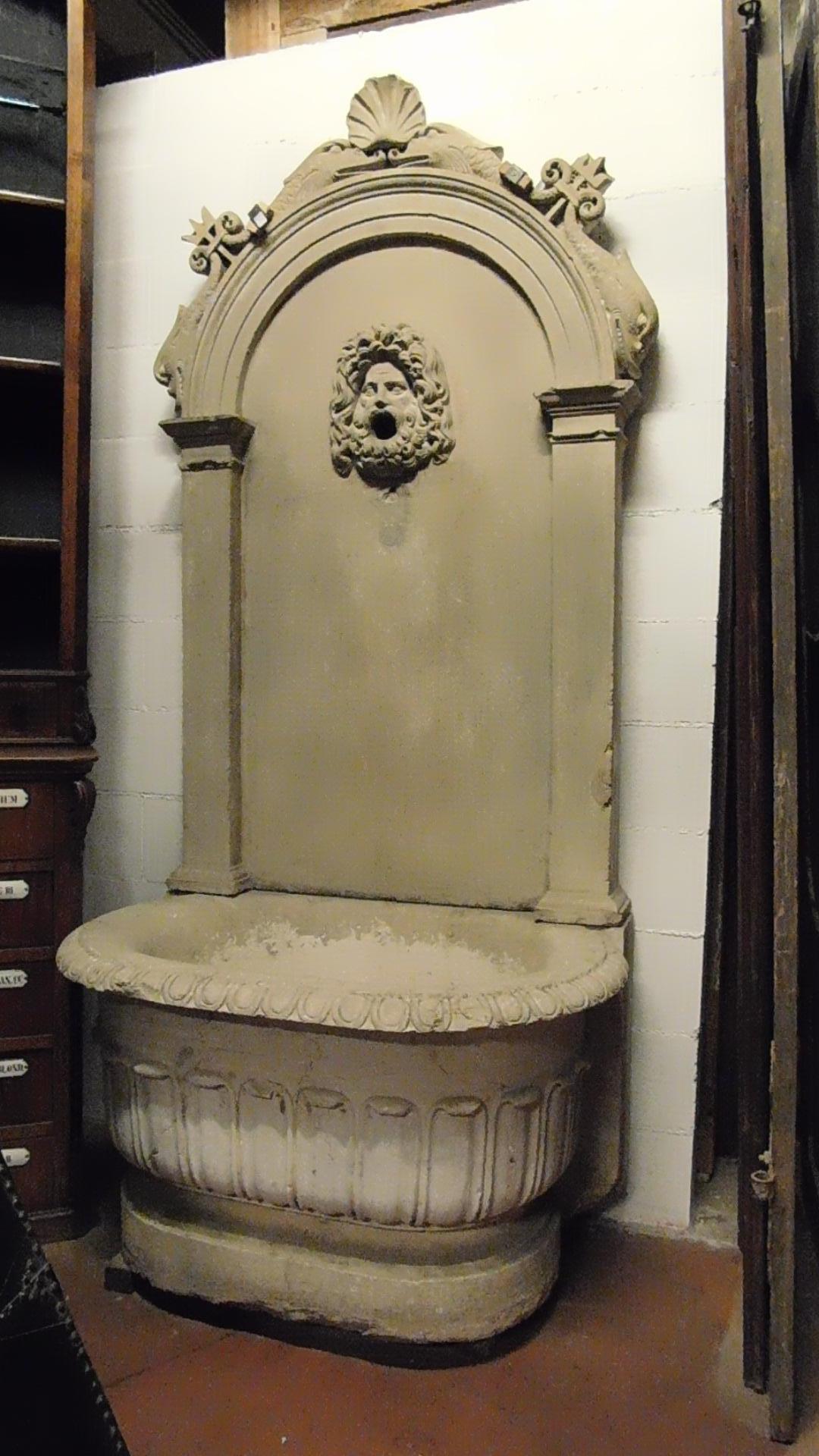 Antique stone fountain with basin and mask, carved tritons and shell, '700 Italy 1