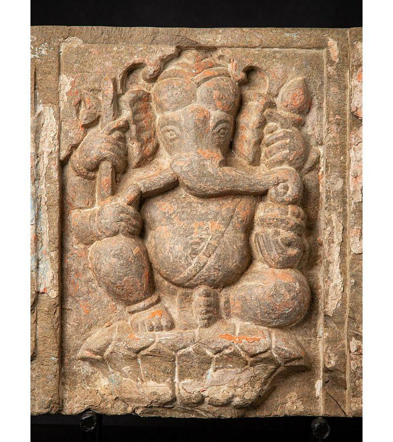 Material: Natural stone
Material: wood
36,8 cm high 
32 cm wide and 14 cm deep
Weight: 15.079 kgs
The sizes of just the stone panel are 31 x 31 cm
Originating from India
18th century - possibly earlier
Was once part of a larger stone panel,