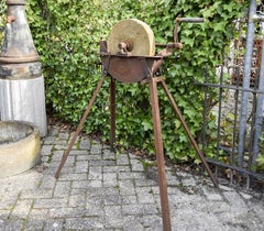 Antique stone grinding wheel with pedestal 19th century