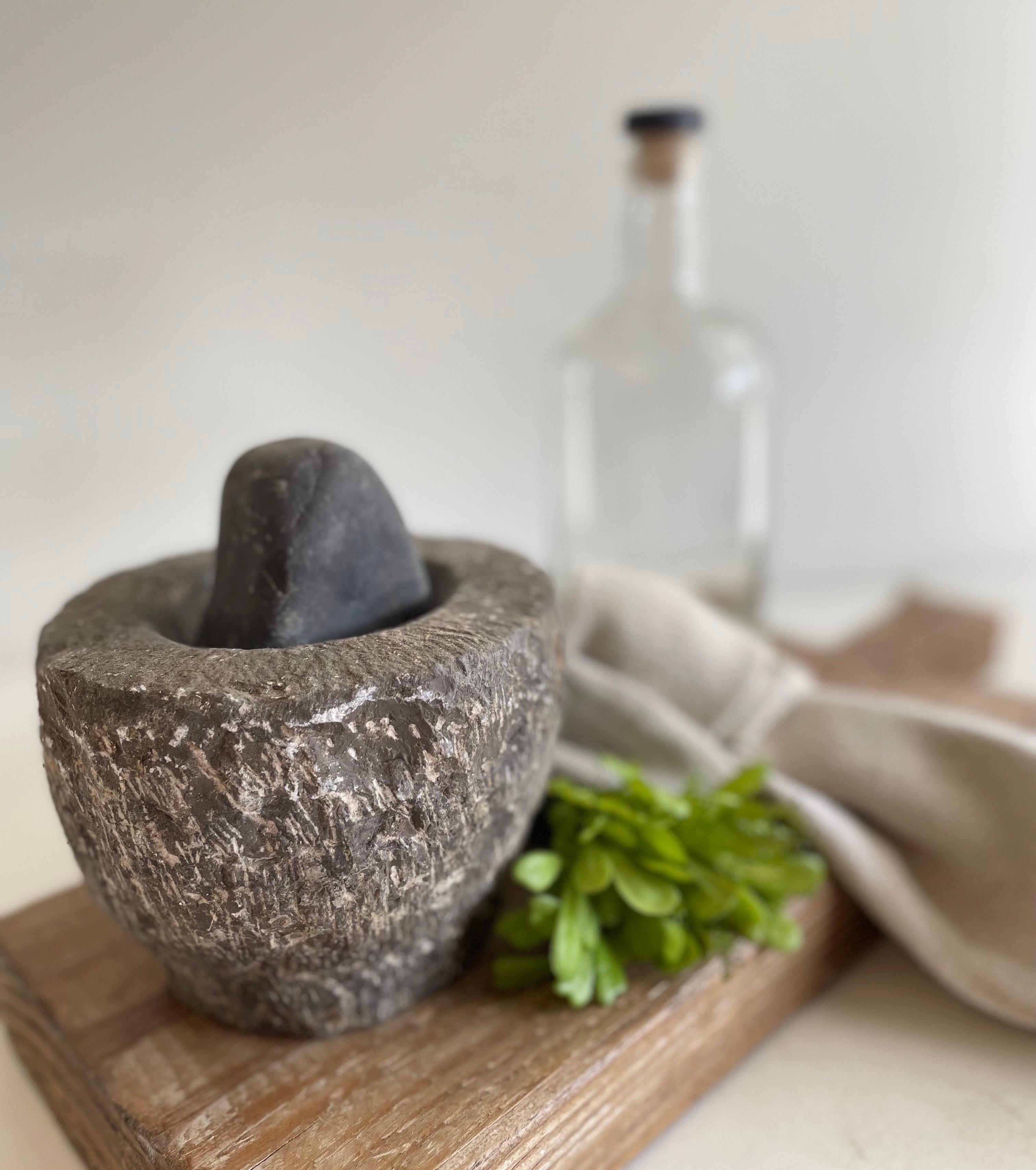 Antique Stone Mortar and Pestle bowl set
Size: 5 1/2”D x 4”H.