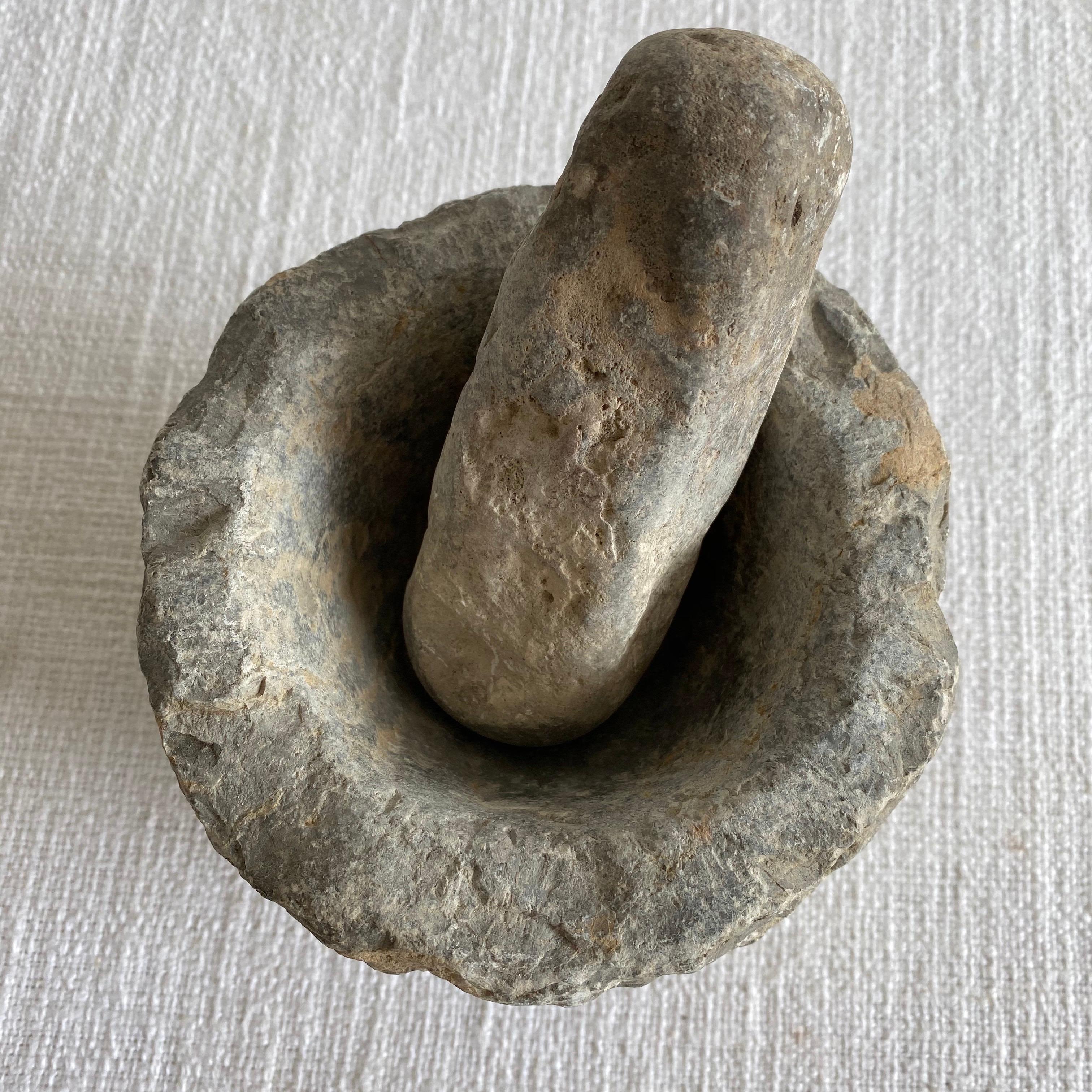 Antique stone mortar and pestle set, solid heavy stone, use as decoration, or for everyday use.
Size: 6” D x 5”
Weight: 10lbs.