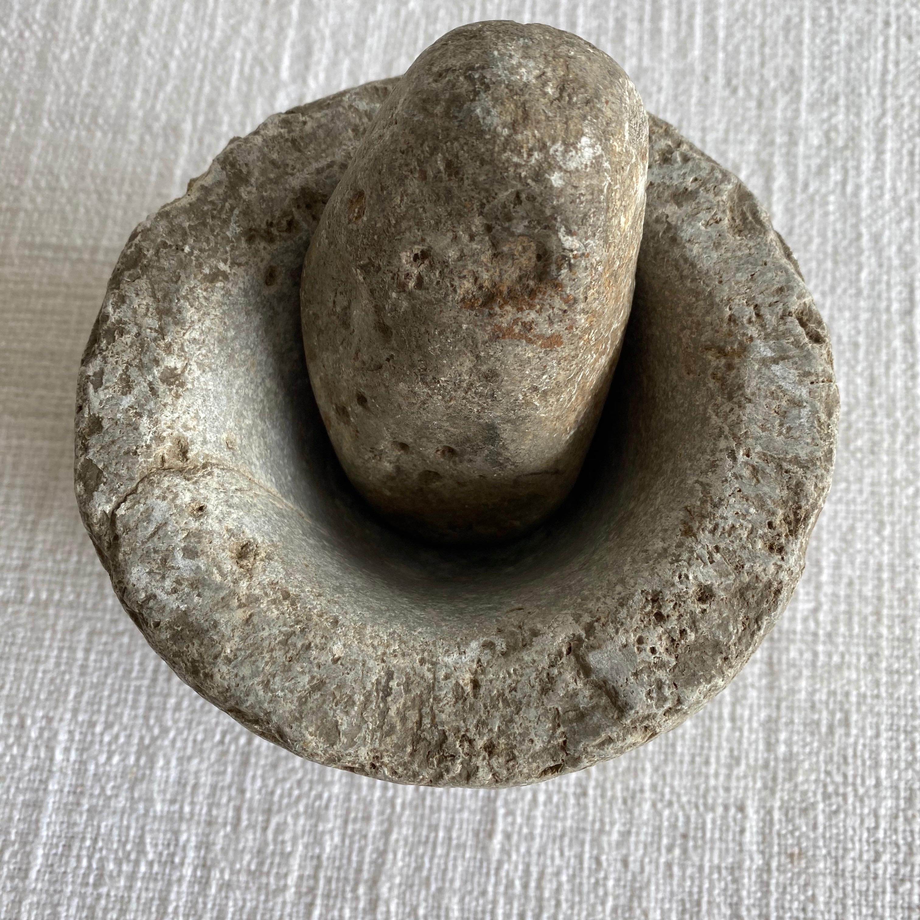Antique stone mortar and pestle set, solid heavy stone, use as decoration, or for everyday use.
Size: 5.5” D x 4.5”
Weight: 10lbs.