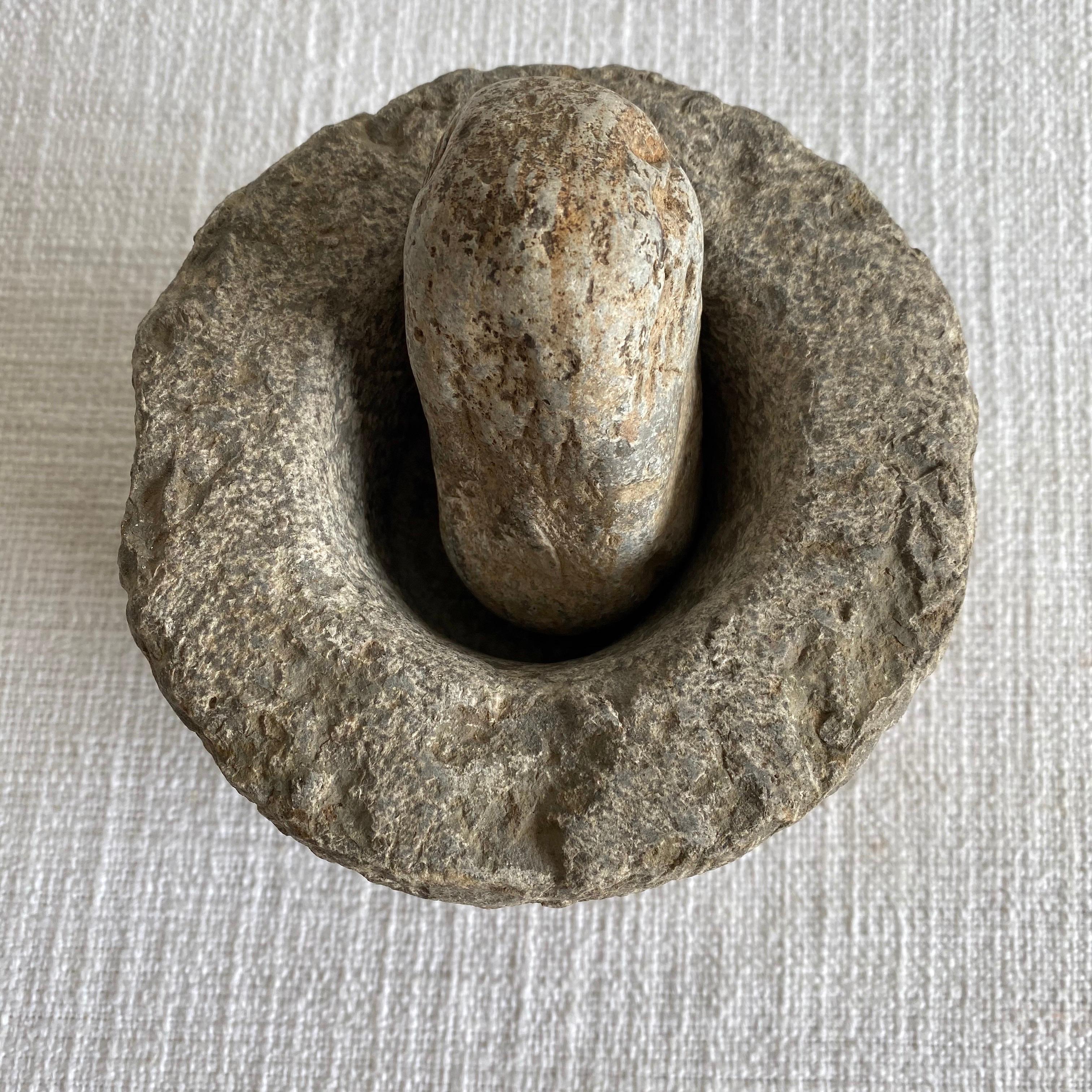 Antique stone mortar and pestle set, solid heavy stone, use as decoration, or for everyday use.
Size: 6” D x 5.5”
Weight: 10lbs.