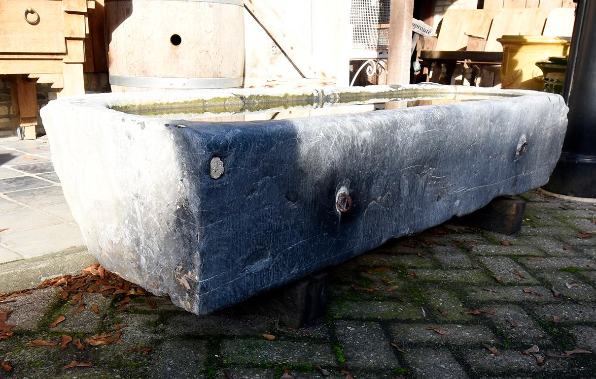 Antique trough made from Belgian bluestone from the 19th century.
Recuperated from a mansion near Brussels, Belgium.