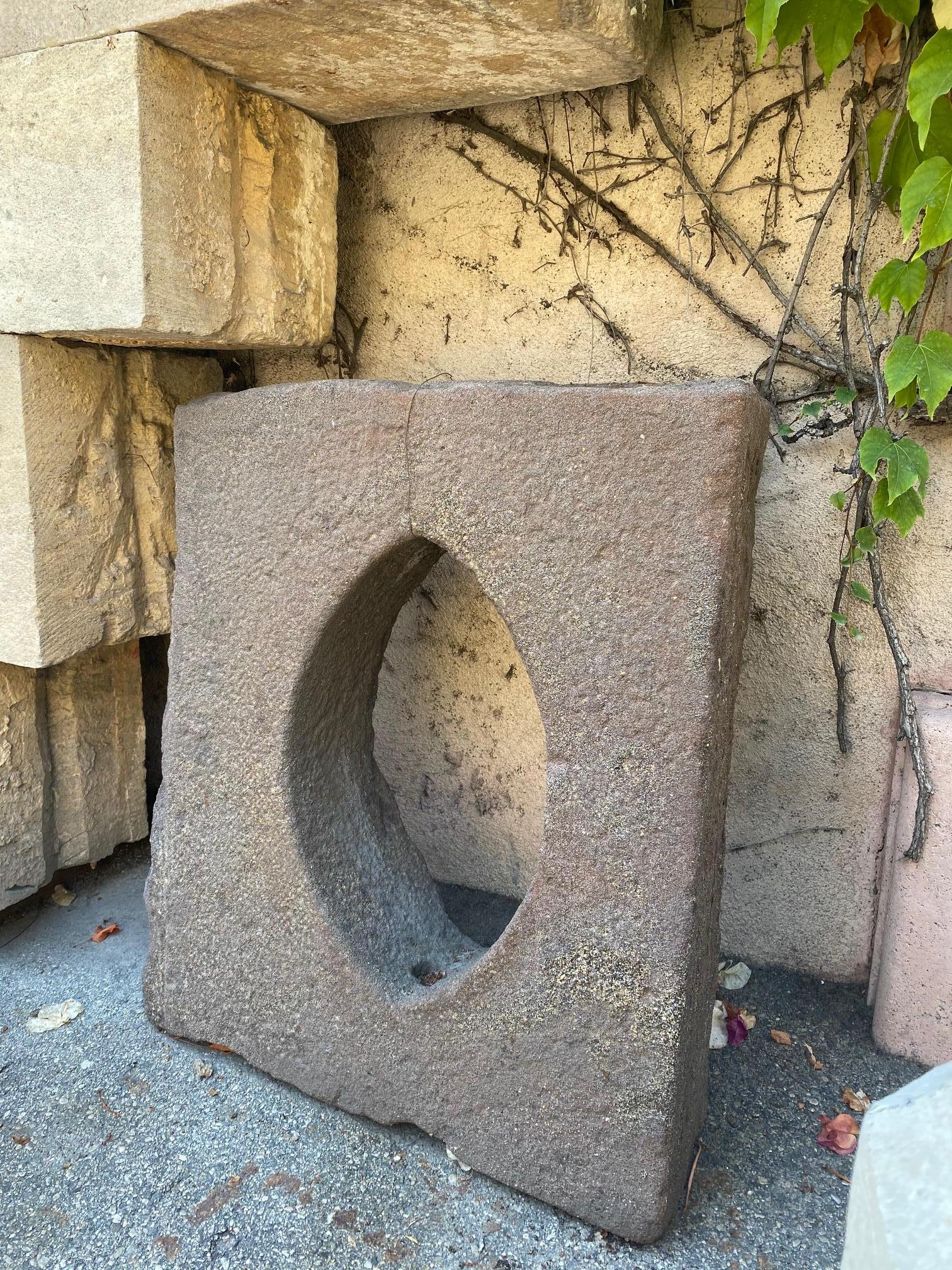 A beautiful late 18th-19th century carved stone window surround architectural element. It could be mounted on a garden wall with a nice fountain mask or spout to create a unique wall mount fountain on top of the vanity. Or installed as a surround