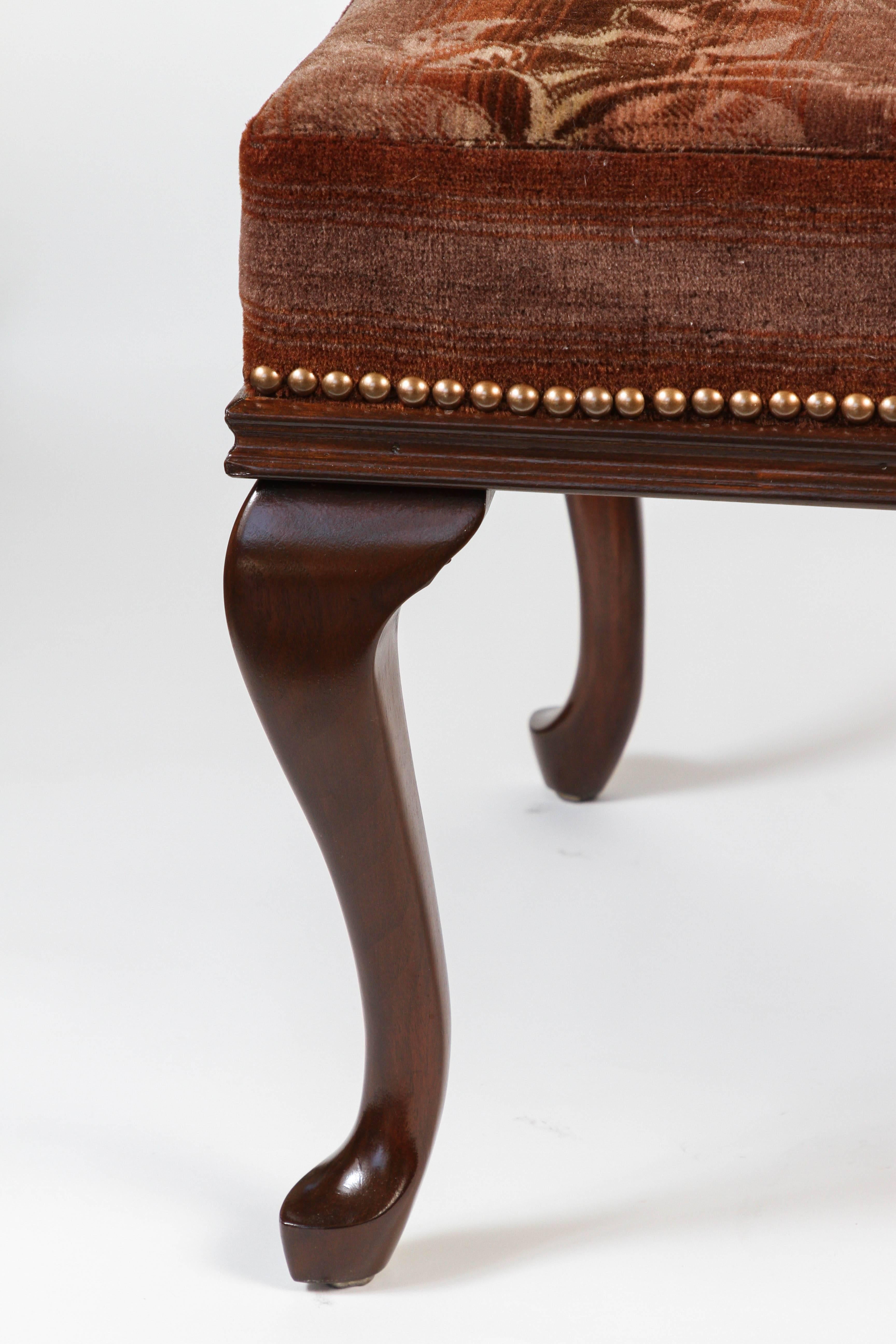 Antique stool with walnut Queen Anne legs that have been newly refinished, all new upholstery vintage wool mohair with floral motif and nailhead trim.