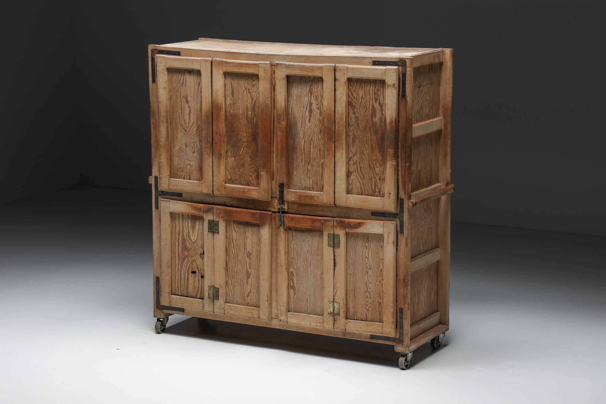 Antique storage piece in oak, early 20th century.

Storage piece, bakery cabinet, made in Europe in the early 20th century. One-of-a-kind piece, originally used to rise bread. Can now be used as a dresser, a wardrobe, or even as a storage piece to