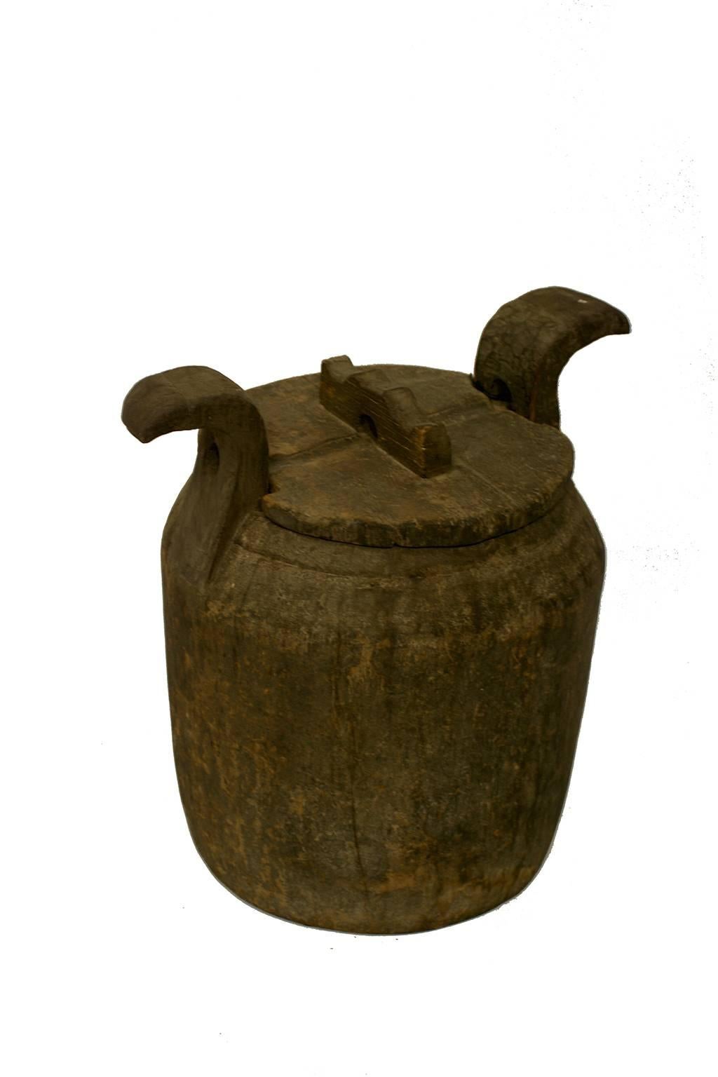 Antique Asian oak rice storage urn, circa 1890.