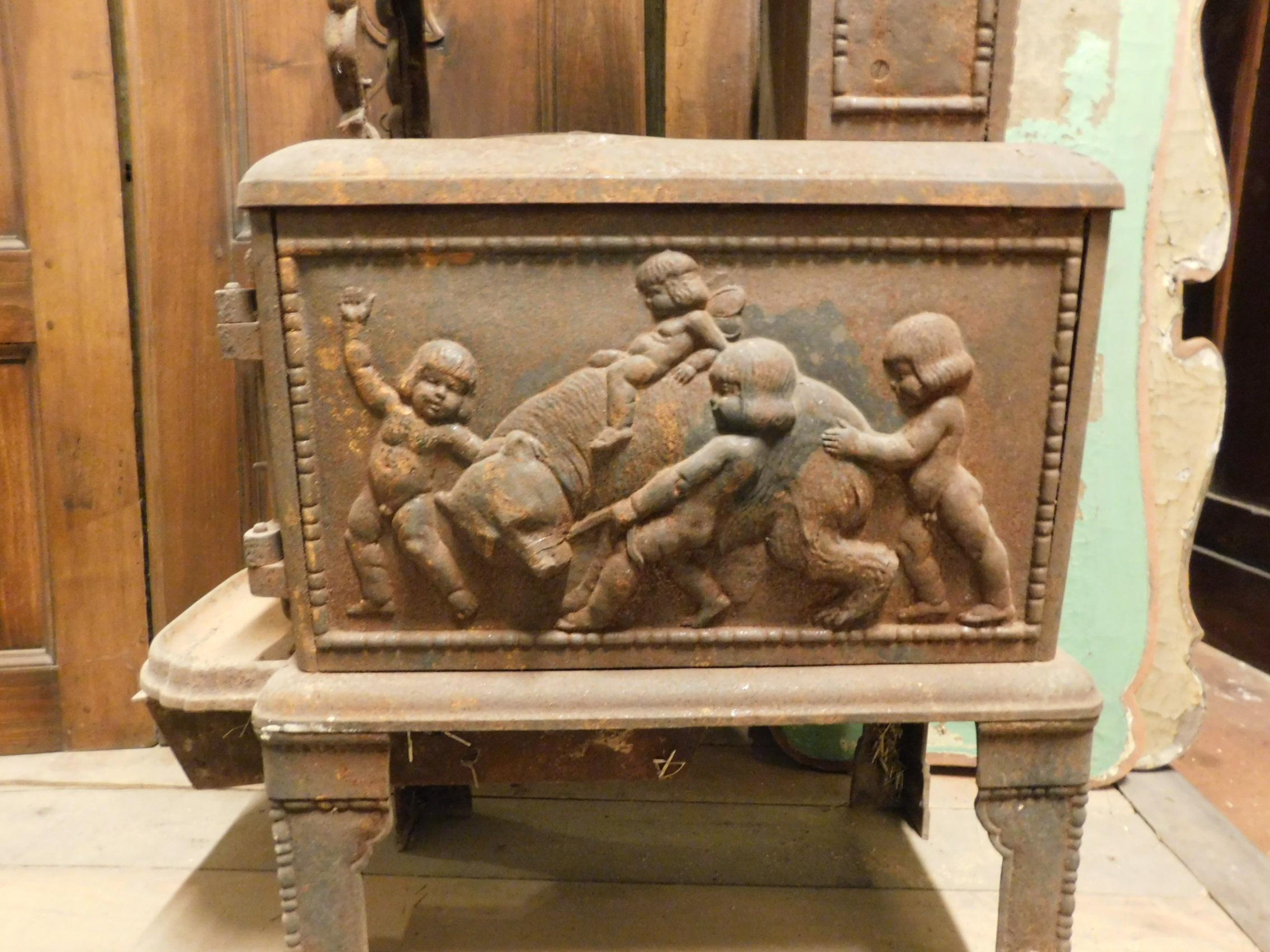 19th Century Antique Stove in Cast Iron, Wood-Burning, Decor on All Sides Cherubs, 1800