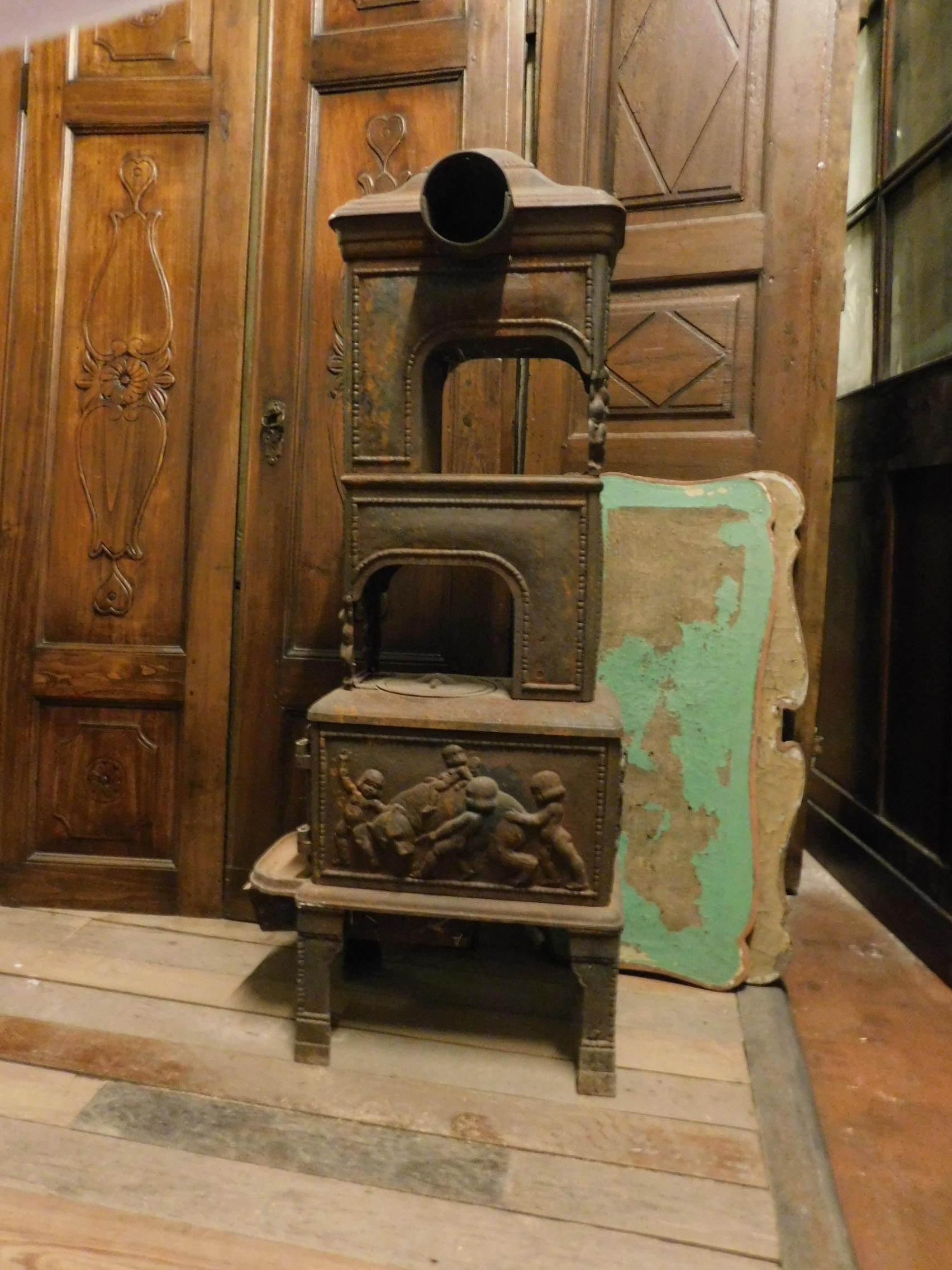 Antique Stove in Cast Iron, Wood-Burning, Decor on All Sides Cherubs, 1800 1