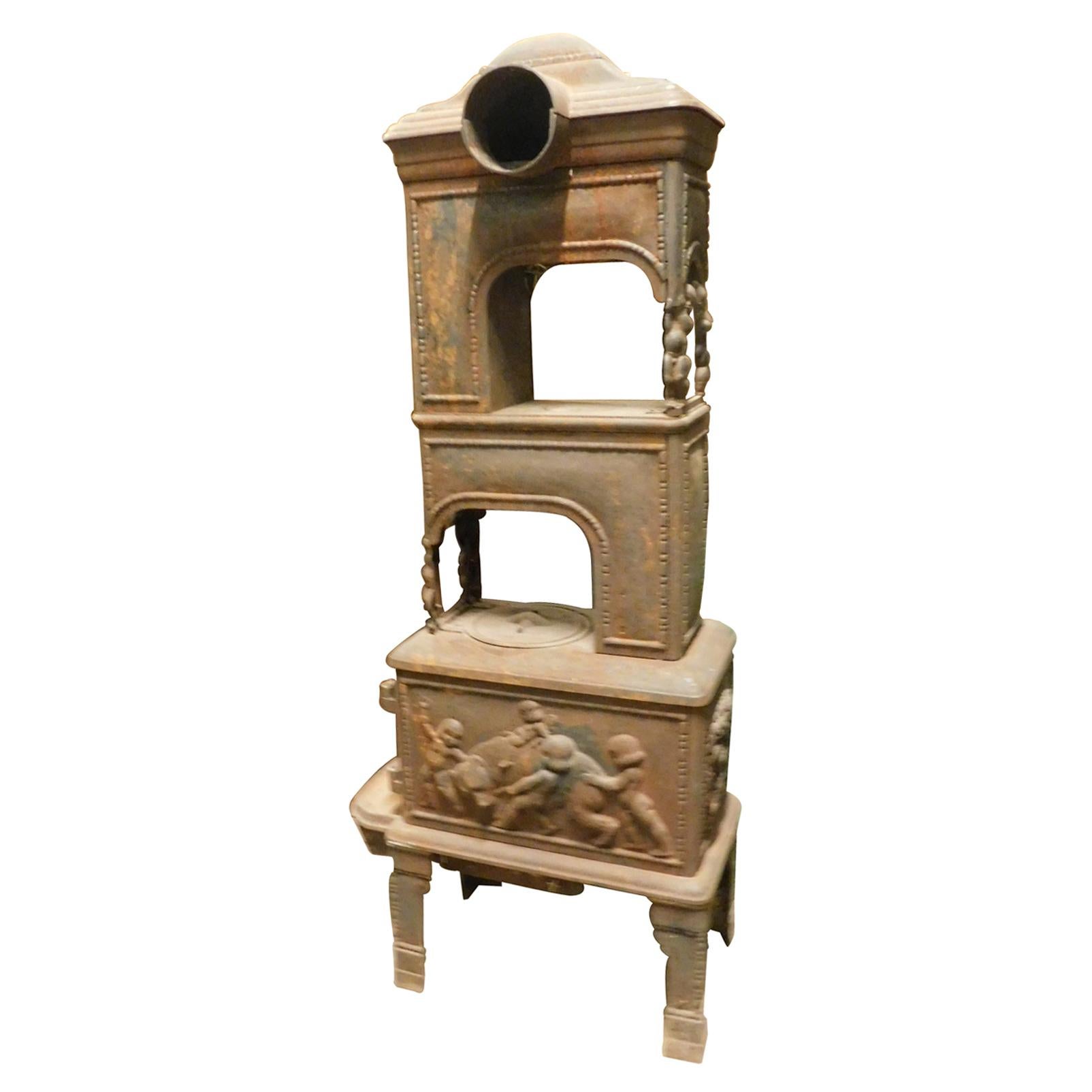 Antique Stove in Cast Iron, Wood-Burning, Decor on All Sides Cherubs, 1800
