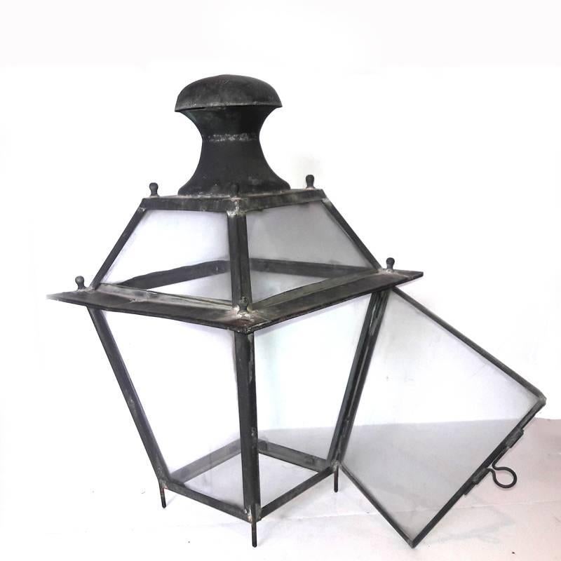 An antique streetlamp top from Paris, late 19th century. Black metal and original glass and lock.
