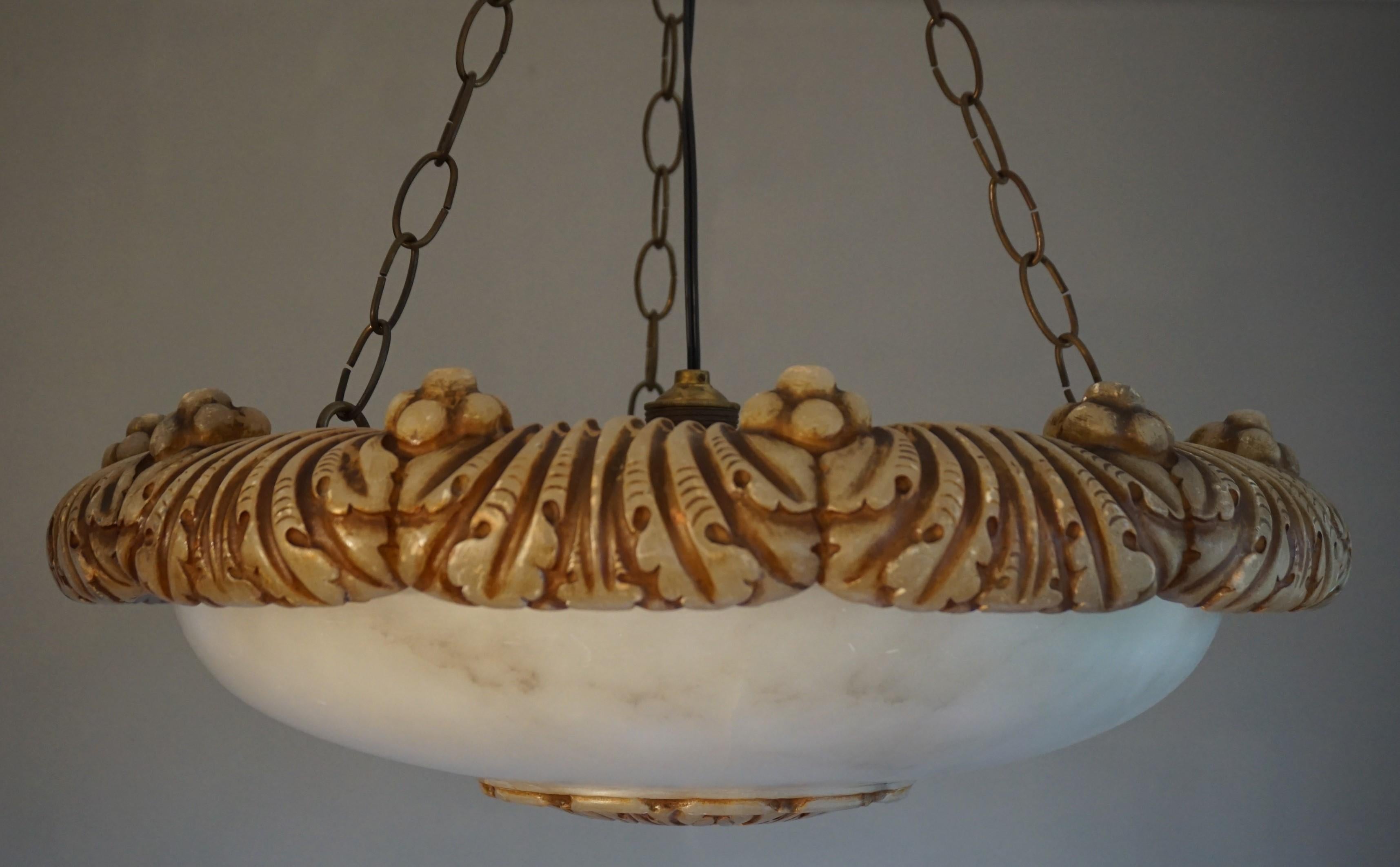 Marvelous size and shape antique pendant.

If you are looking for the perfect pendant to grace your living room, kitchen, bedroom or large hallway then this handcrafted antique could be perfect for you. This highly stylish and majestic alabaster