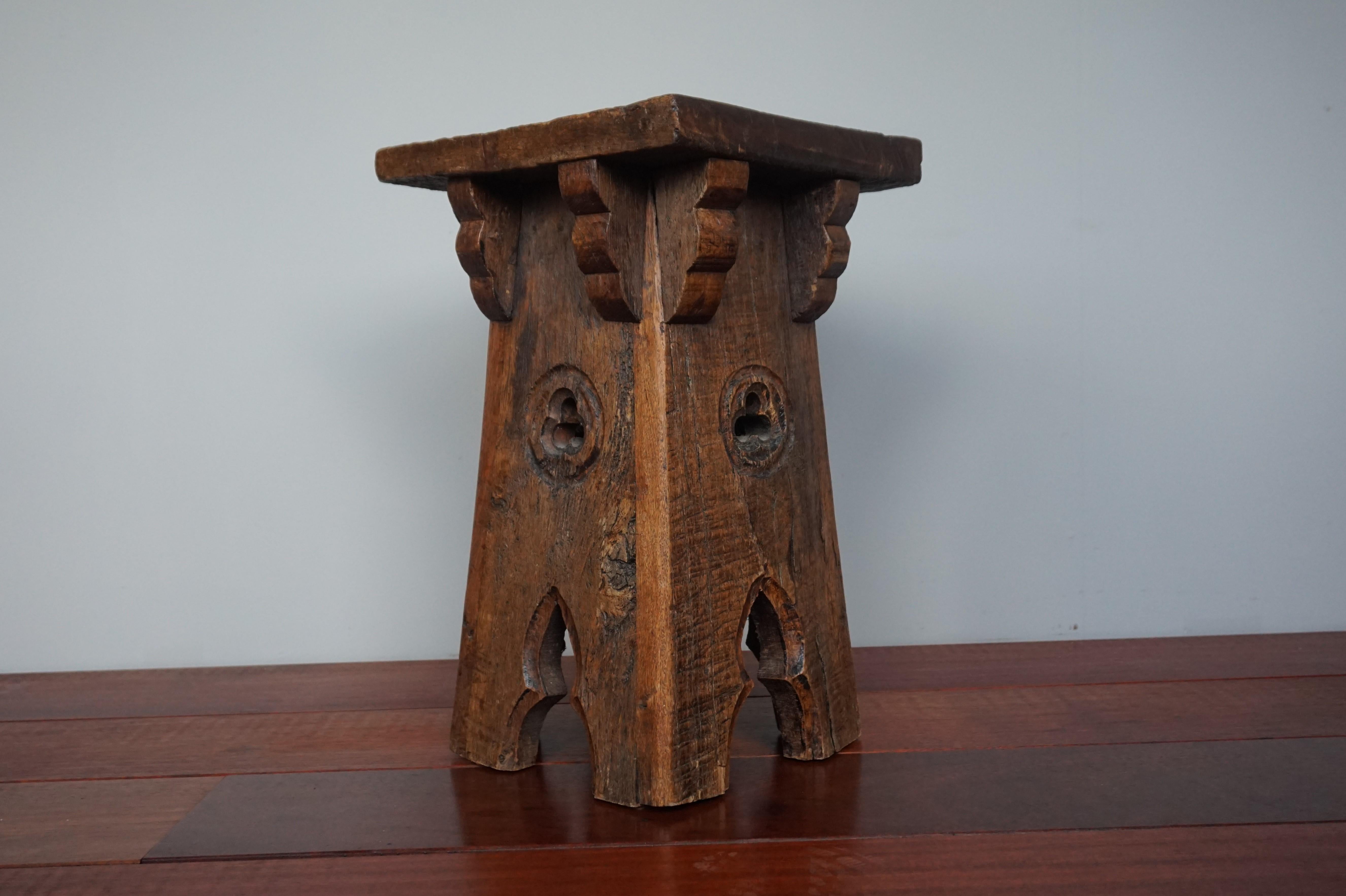 Truly medieval looking, little antique table in the Gothic style.

This Gothic Revival table very much looks like a 17th or 18th century specimen. However, we are certain that this table was created in the early 1900s using very old oakwood.