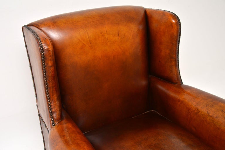 Antique Studded Leather Wing Back Club Armchair In Good Condition For Sale In London, GB