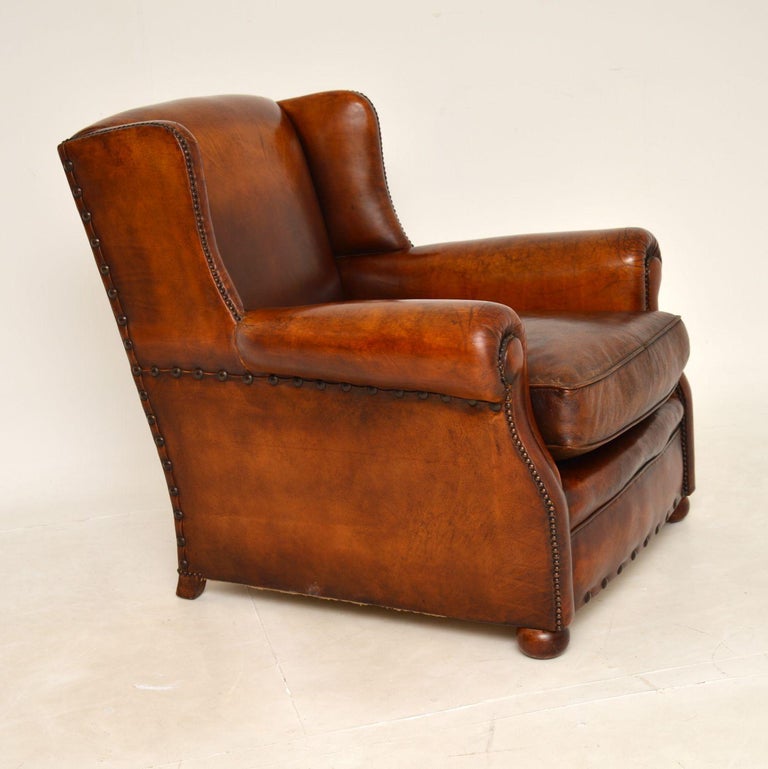 20th Century Antique Studded Leather Wing Back Club Armchair For Sale
