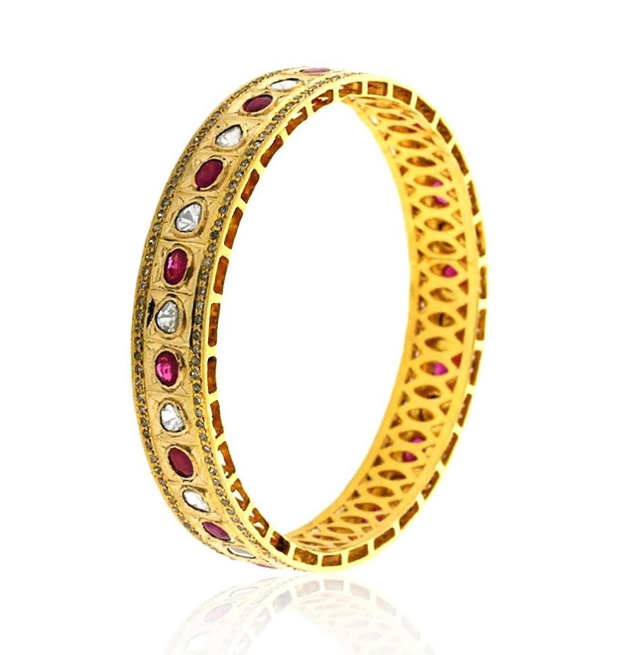 A stunning bracelet handmade in 14K gold. It is set in 4.0 carats ruby and 3.02 carats rosecut diamonds. Clasp Closure

FOLLOW  MEGHNA JEWELS storefront to view the latest collection & exclusive pieces.  Meghna Jewels is proudly rated as a Top