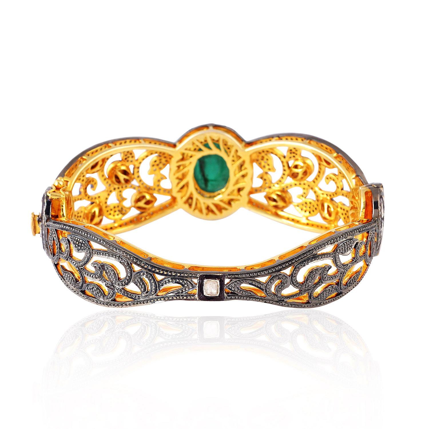 A stunning bracelet handmade in 18K gold & sterling silver with blackened finish. It is set in 5.09 carats emerald & 5.99 carats rosecut diamonds. Clasp Closure
Instock

FOLLOW  MEGHNA JEWELS storefront to view the latest collection & exclusive