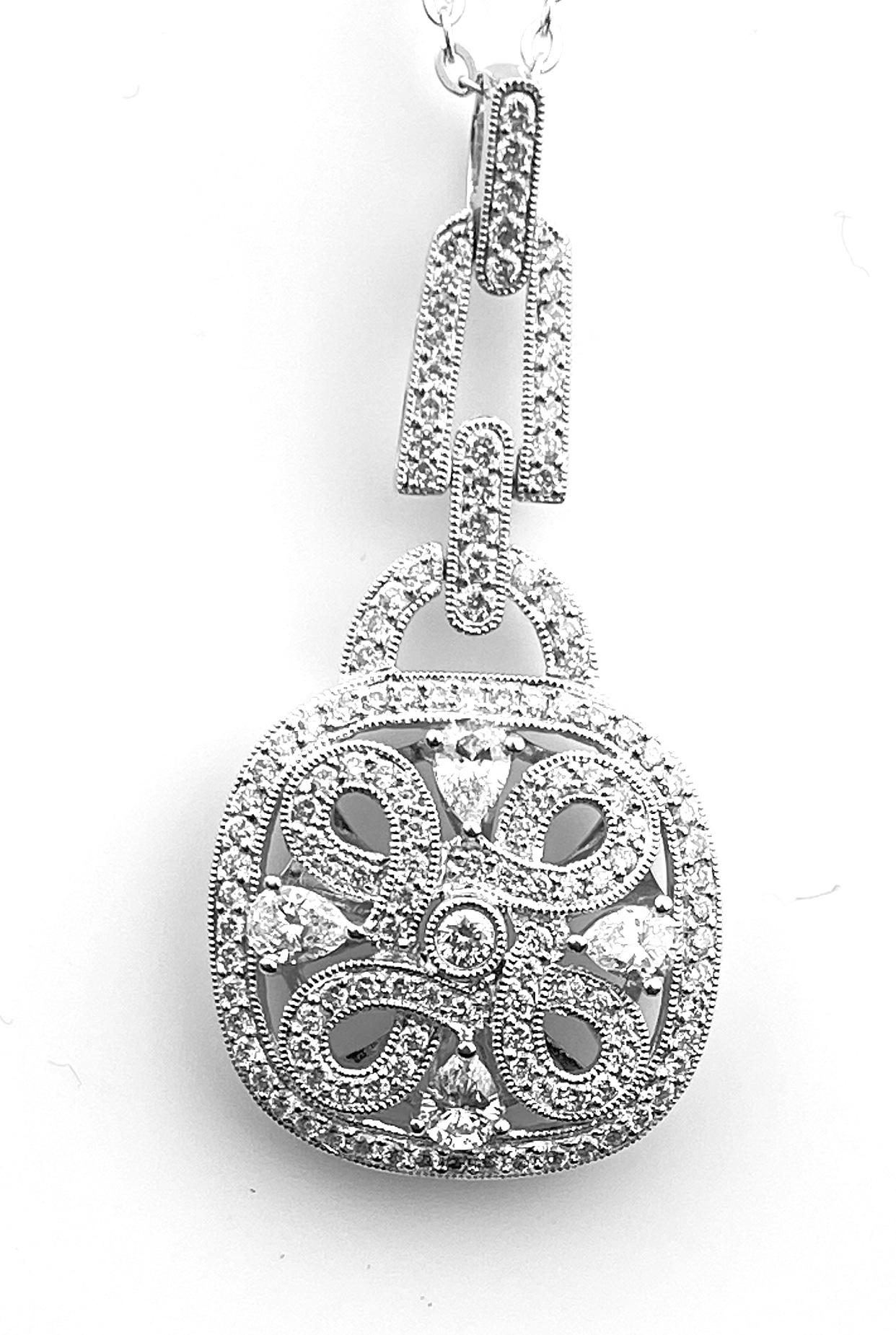 Ladies' antique style Crivelli diamond medallion pendant necklace with a quatrefoil design. Set in 18kt white gold micro-set with 135 pear-cut and round brilliant diamonds of 1.30ct total. On 18