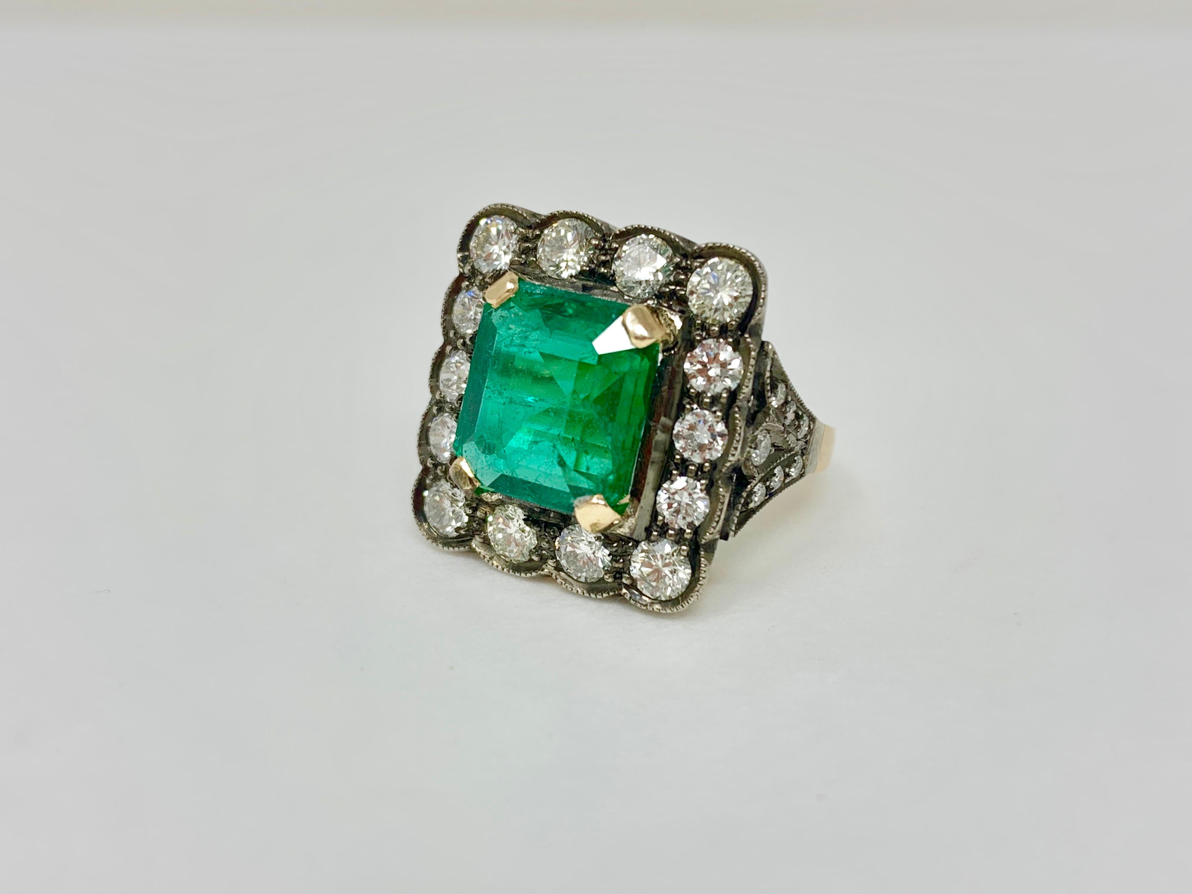 Antique Style Emerald and Diamond Engagement Ring in 18 Karat Gold In New Condition In New York, NY