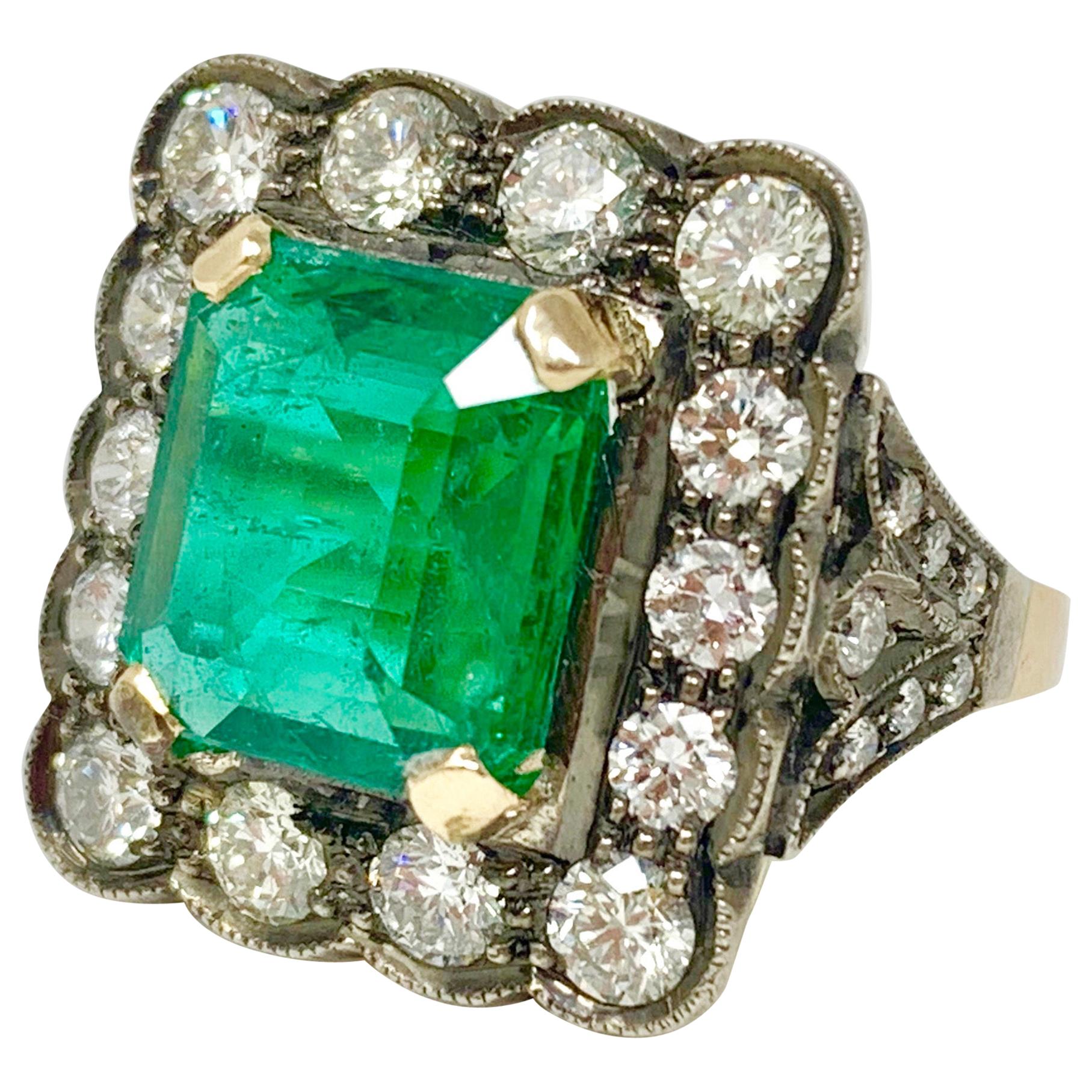 Antique Style Emerald and Diamond Engagement Ring in 18 Karat Gold