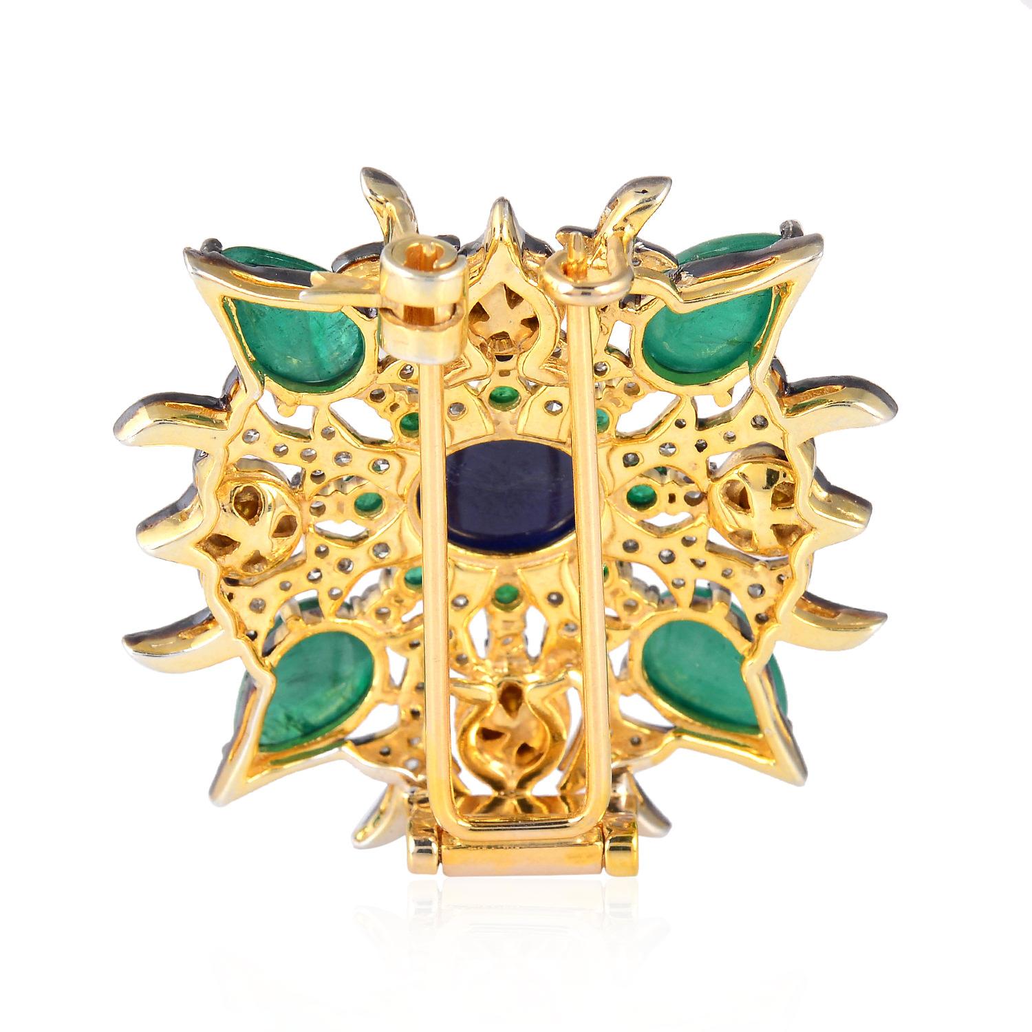 A stunning brooch cast in 18 karat gold & sterling silver.  It is hand set in 5.25 carats emerald, 4.3 carats blue sapphire and 1.76 carats of sparkling diamonds.

FOLLOW  MEGHNA JEWELS storefront to view the latest collection & exclusive pieces. 