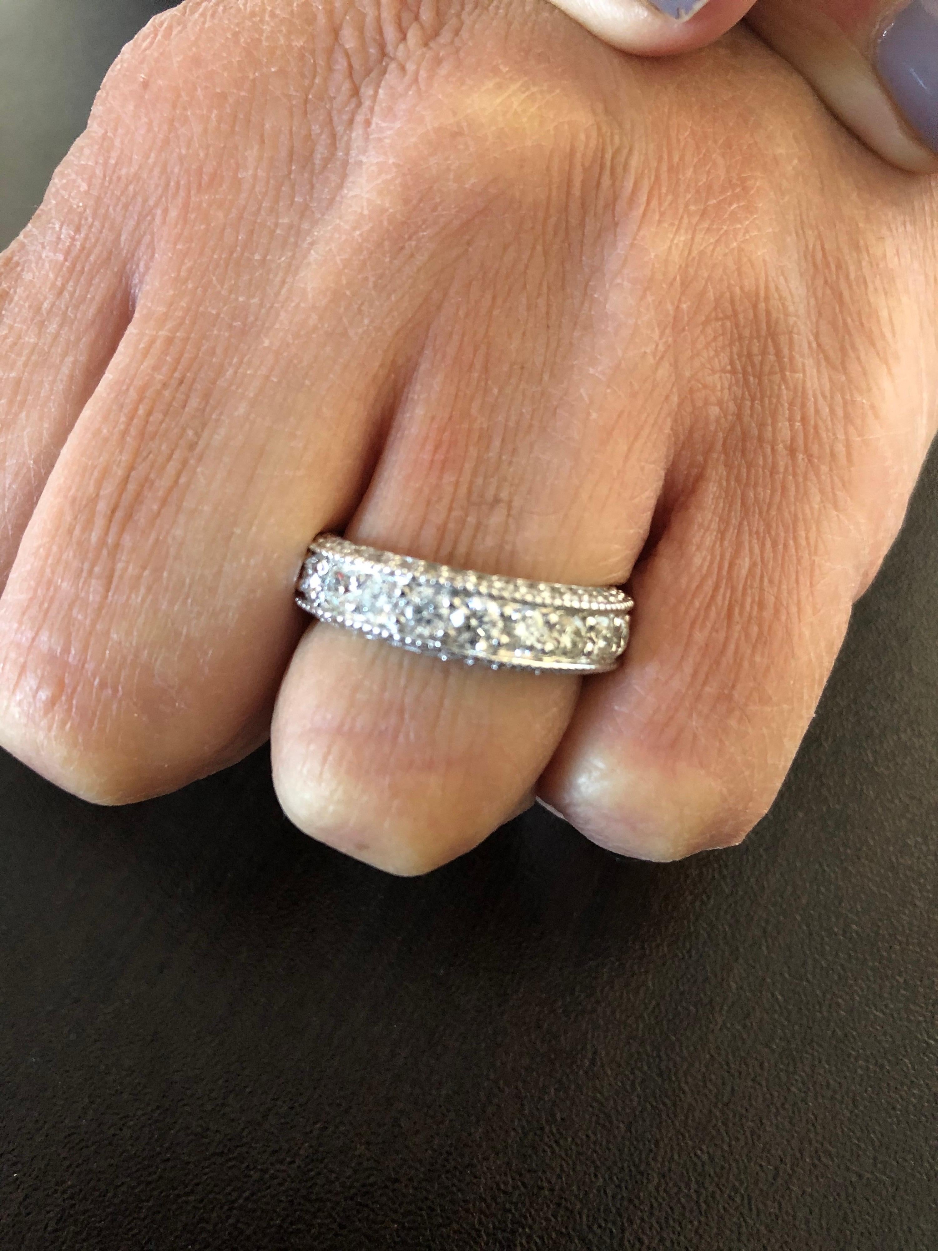 Diamond Eternity ring set in 14K white gold with 3 rows of diamonds. In the middle of the band the ring is set with 0.10 carat stones. On the 2 sides of the ring the diamonds are set wit 0.02 carats. The total diamond weight is 3.20 carats. The