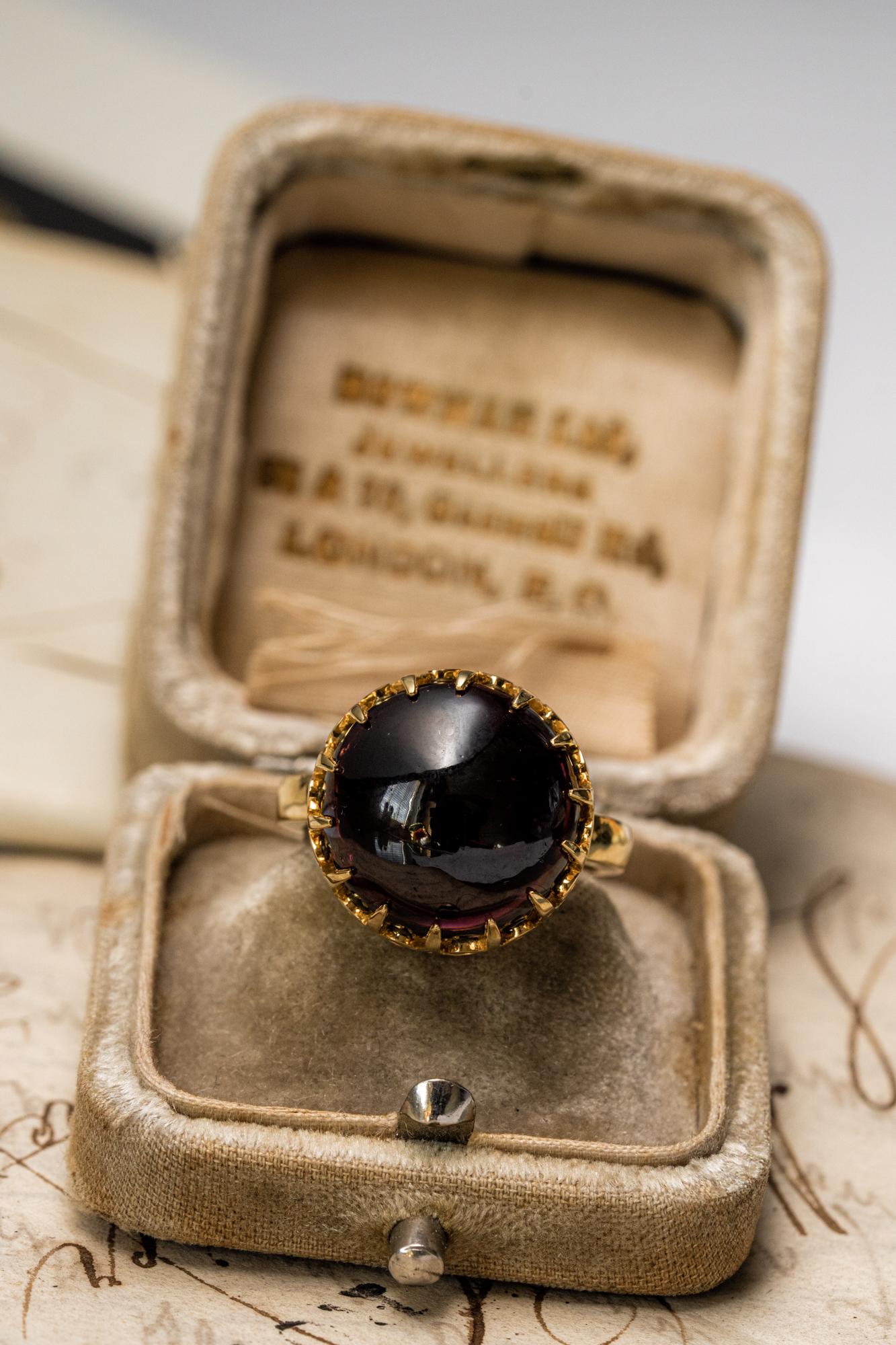 Unisex solid gold ring set with natural garnet cabochon. Antique Victorian revival of the old designs. This ring is skuilfully crafted by our bench from recycled gold and ethically sourced garnet. 

Details: 
Metal: solid 10k yellow gold;
Stone: