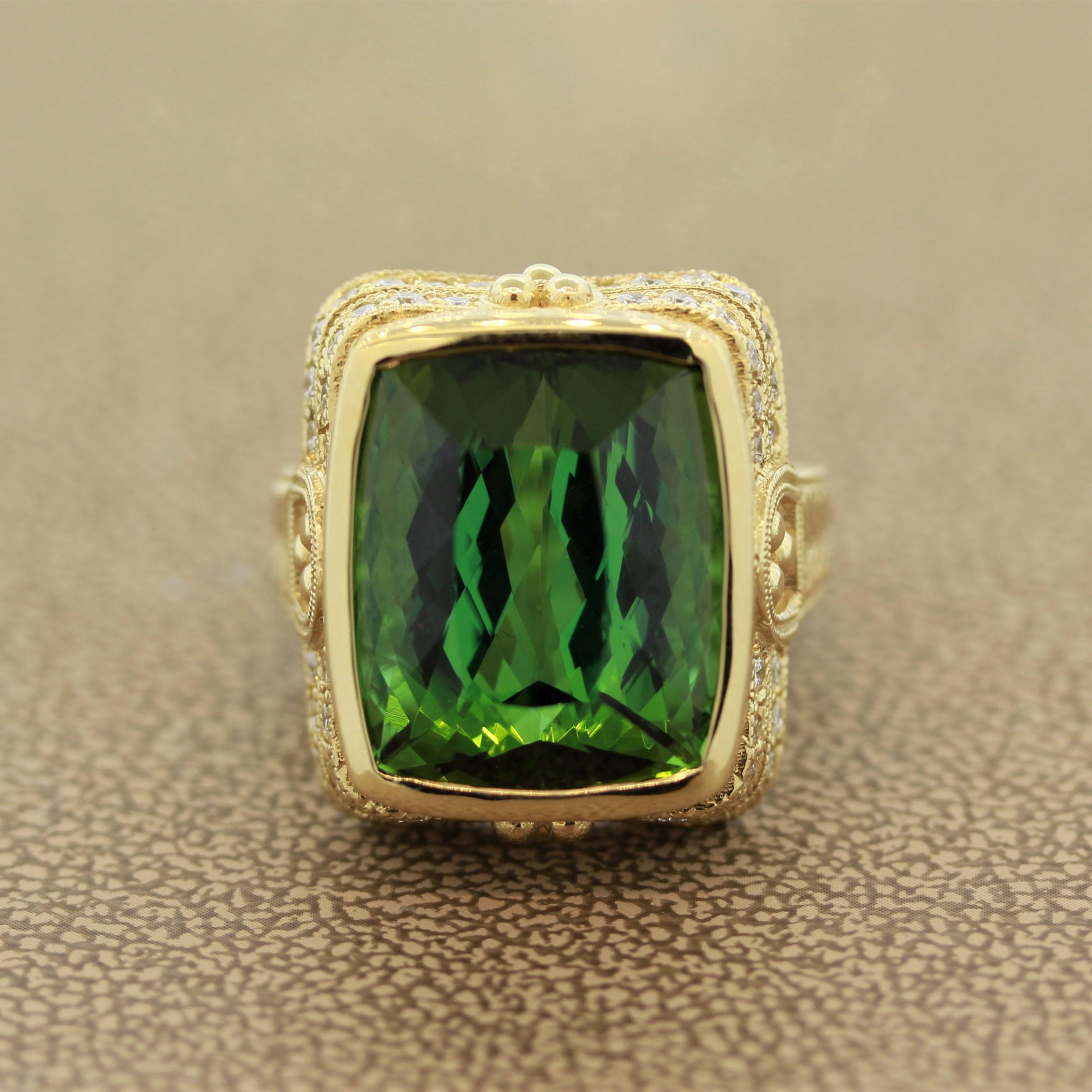 A large cocktail ring made in an antique style with milgrain settings and decorative filigree. It features a luscious green tourmaline weighing 17.85 carats with no visible inclusions. It is accented by 0.86 carats of round brilliant cut diamonds